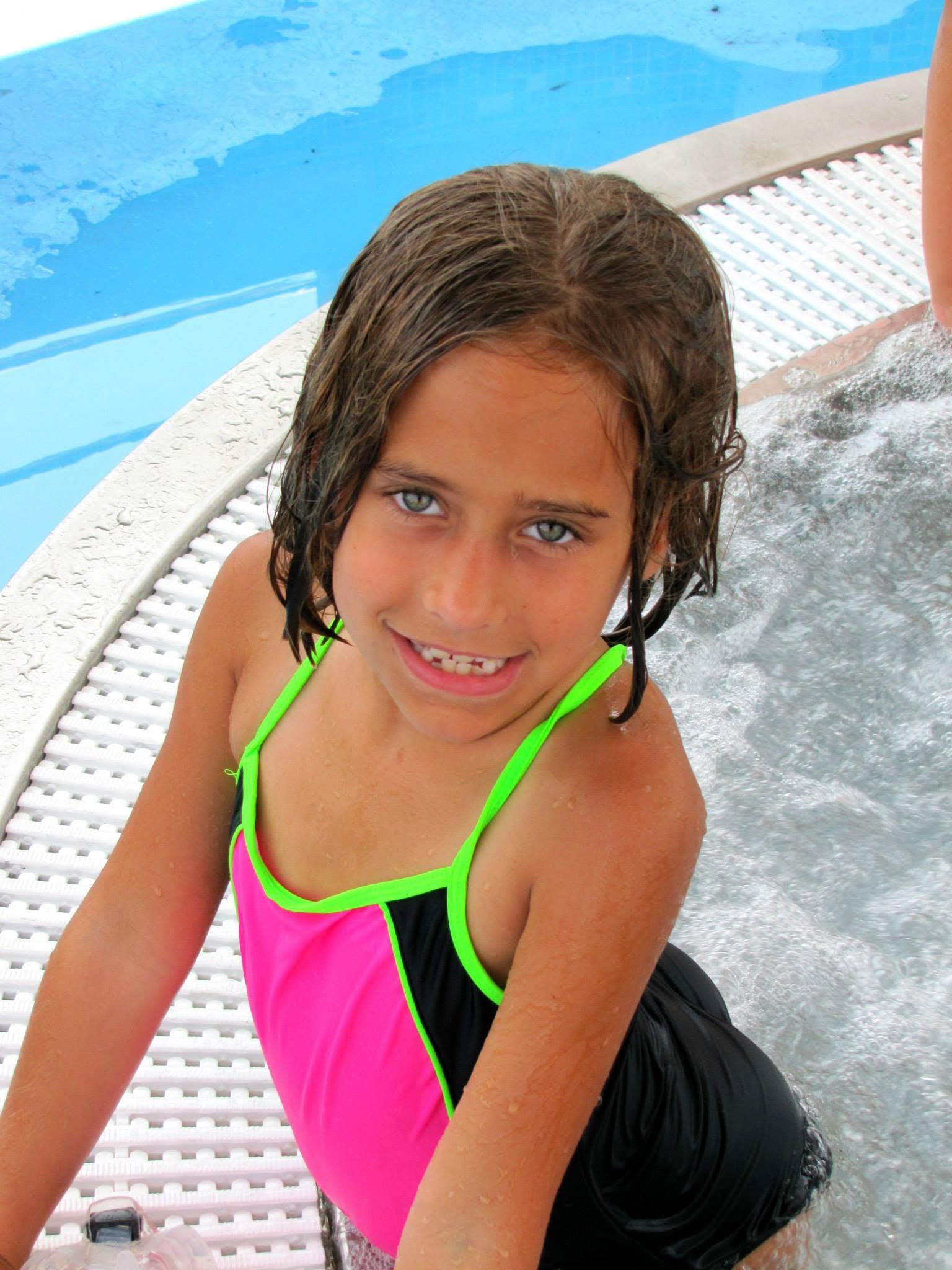 Lisa beside the hot tub, thrilled to be aboard