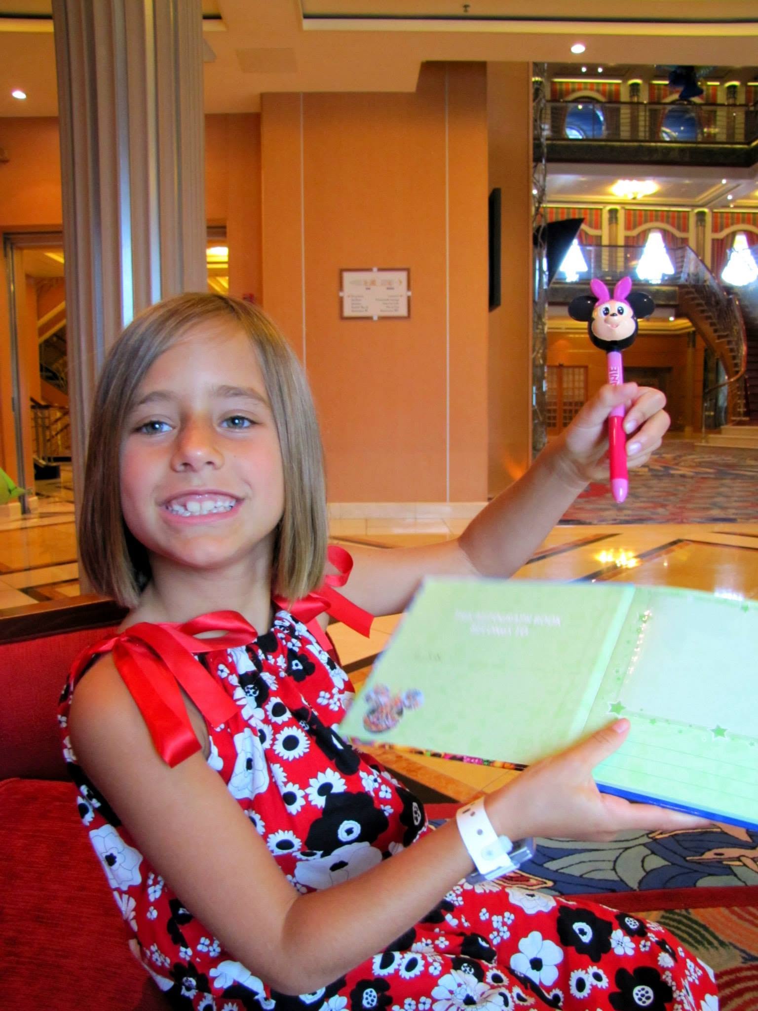 Lisa with her autograph book aboard the Magic