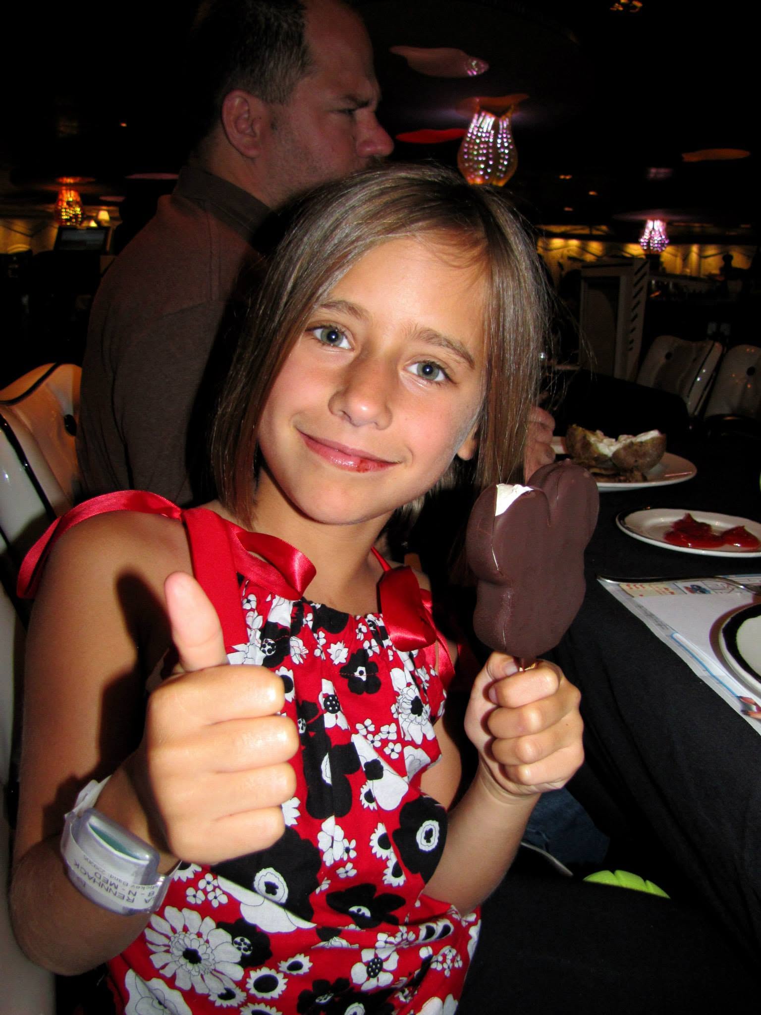 Lisa gives a Mickey ice cream bar a thumbs up