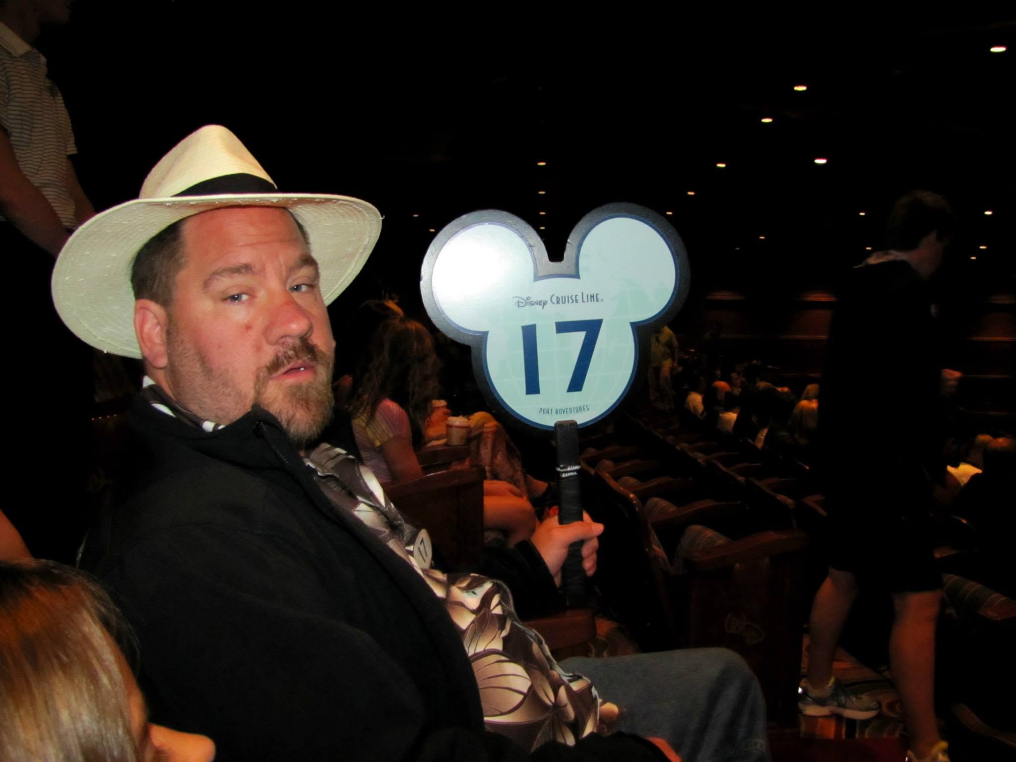 Michael with the group 17 paddle in the ship's theater