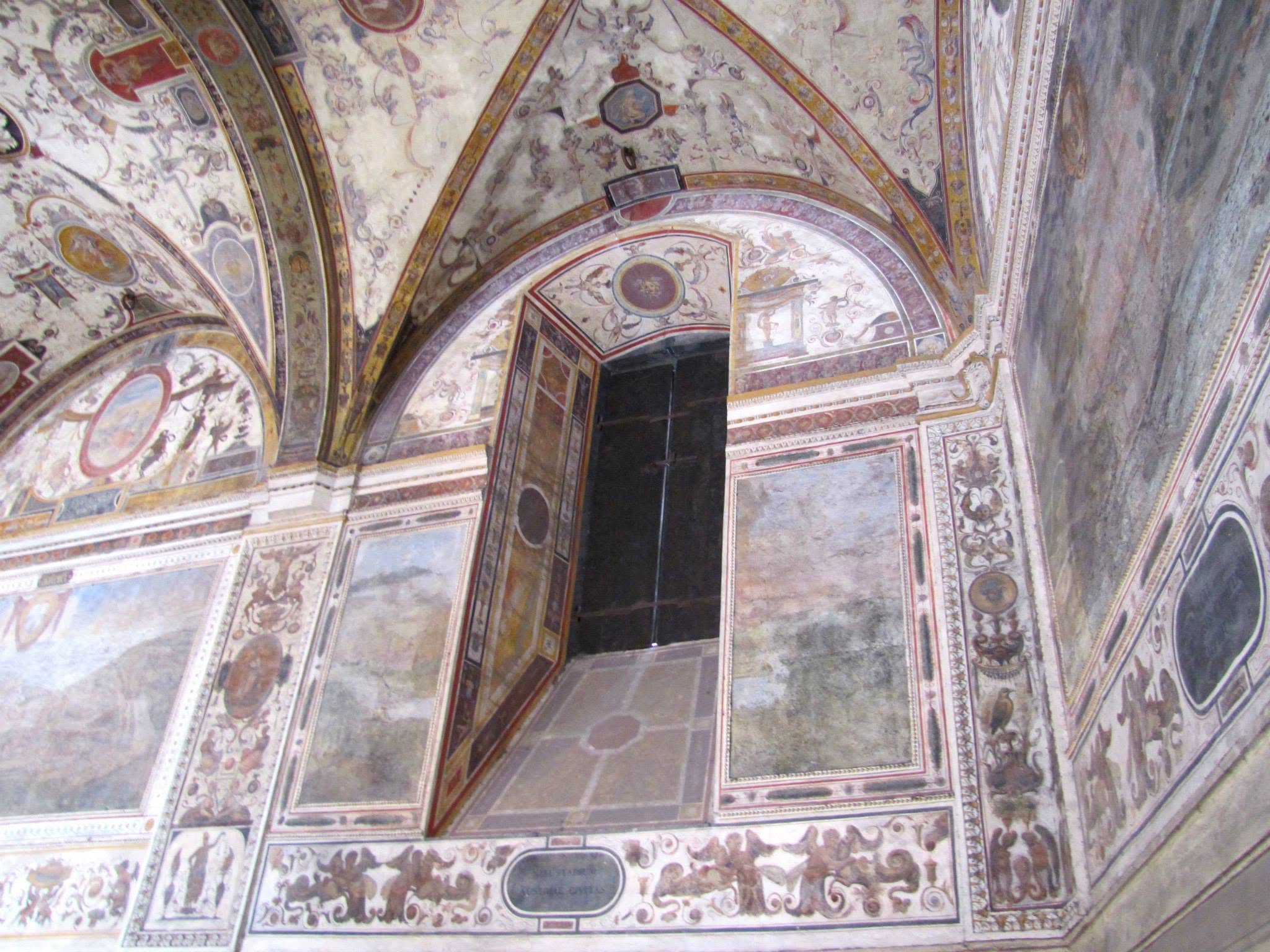 A painted ceiling in a building on our Florence walk