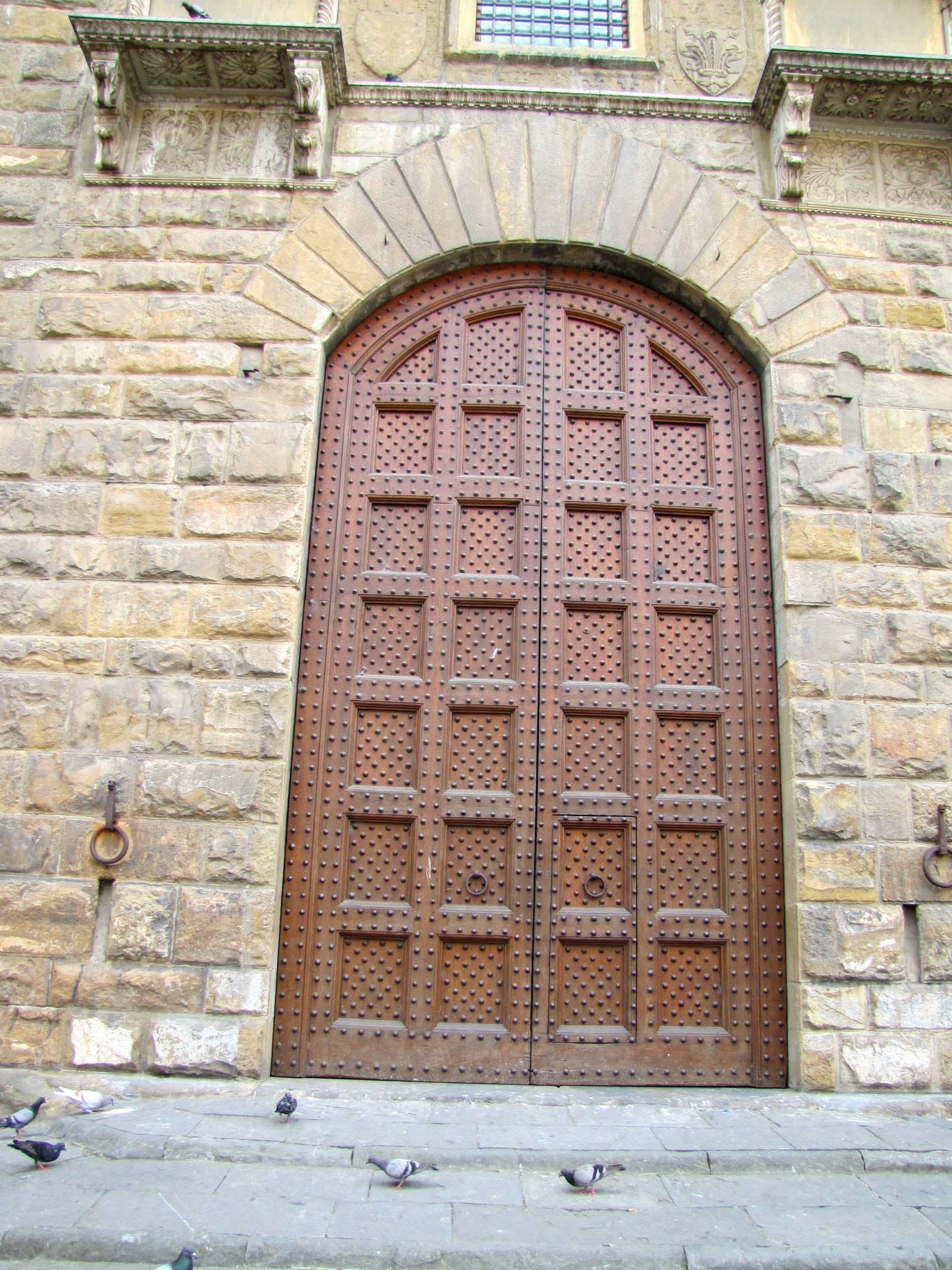 A giant door with a smaller man door built in