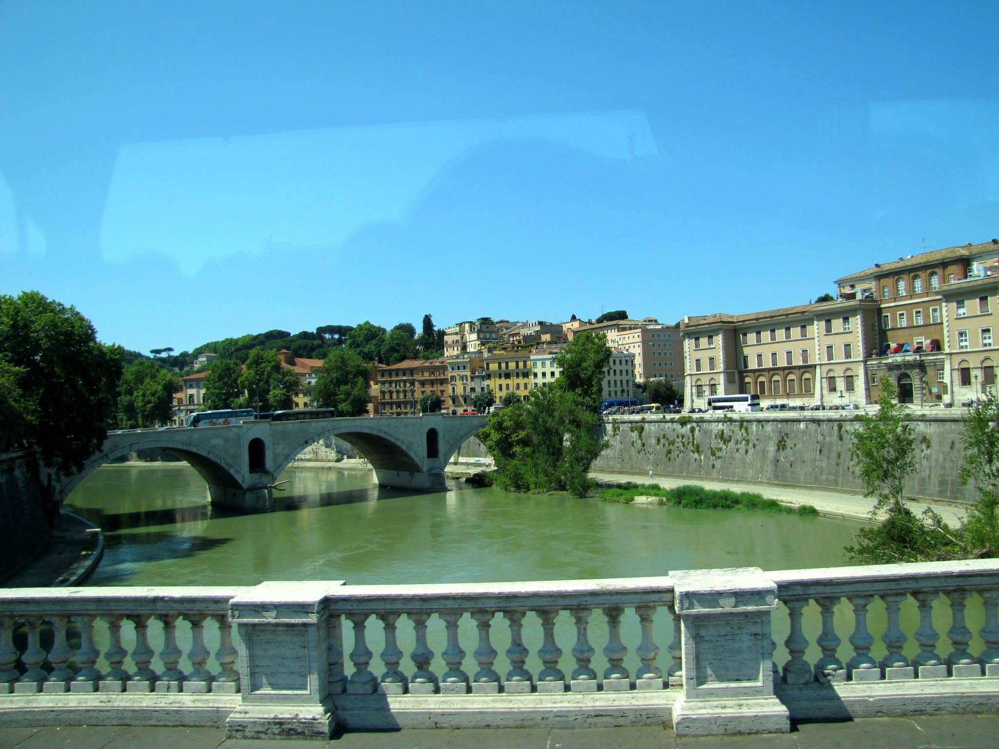Crossing the Tiber River in Rome