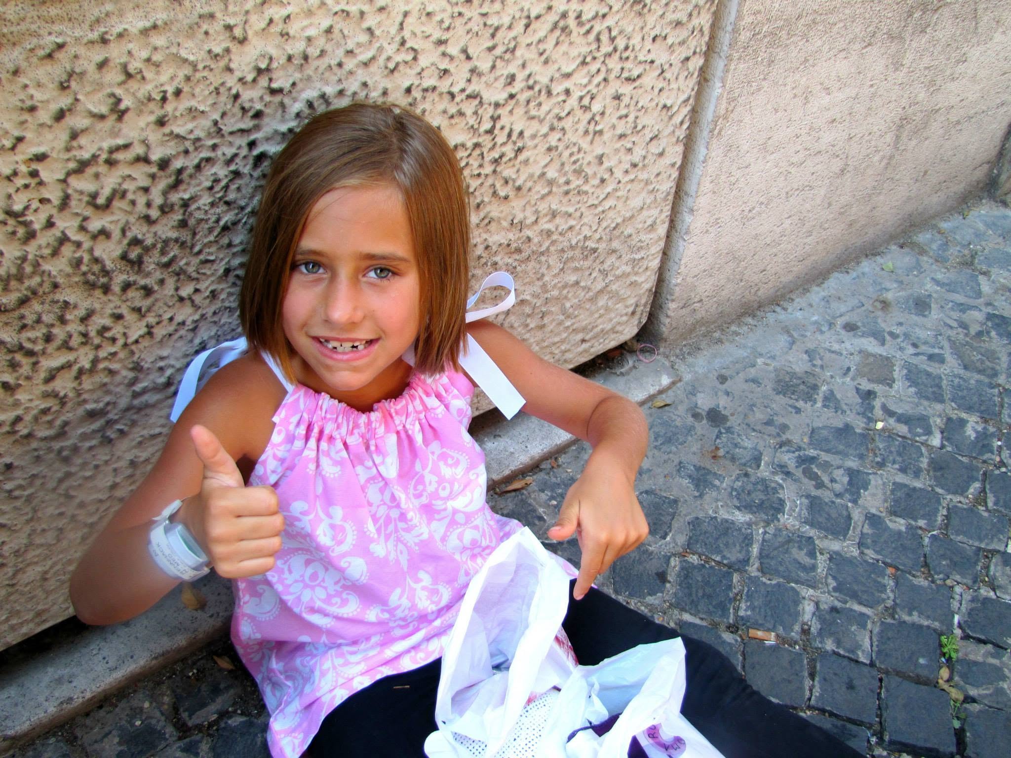 Lisa after choosing her purple silk scarf at the Vatican