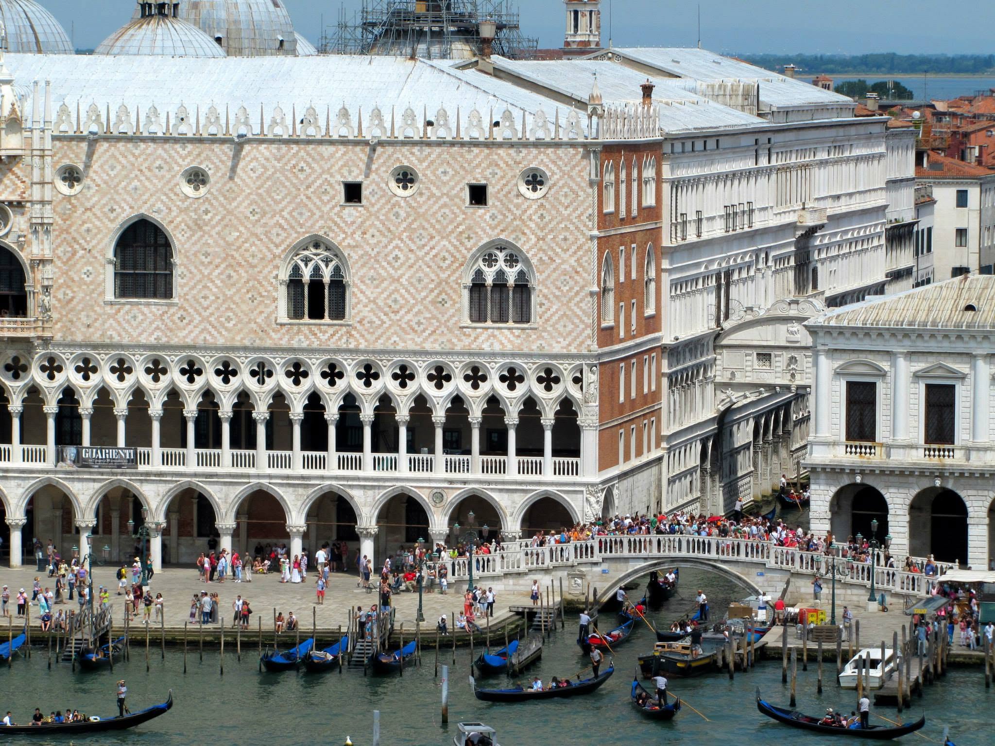The Doge's Palace and the crowded bridge beside it