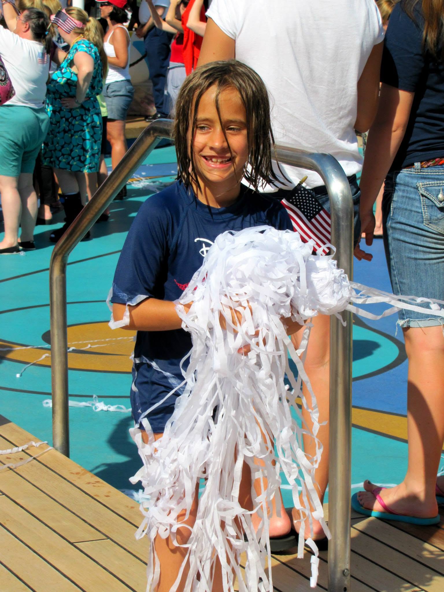 Lisa with a pile of streamers at the deck party