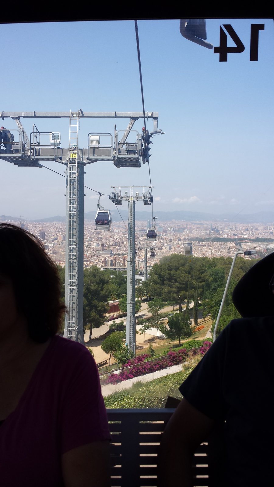 Riding the cable car up Montjuic