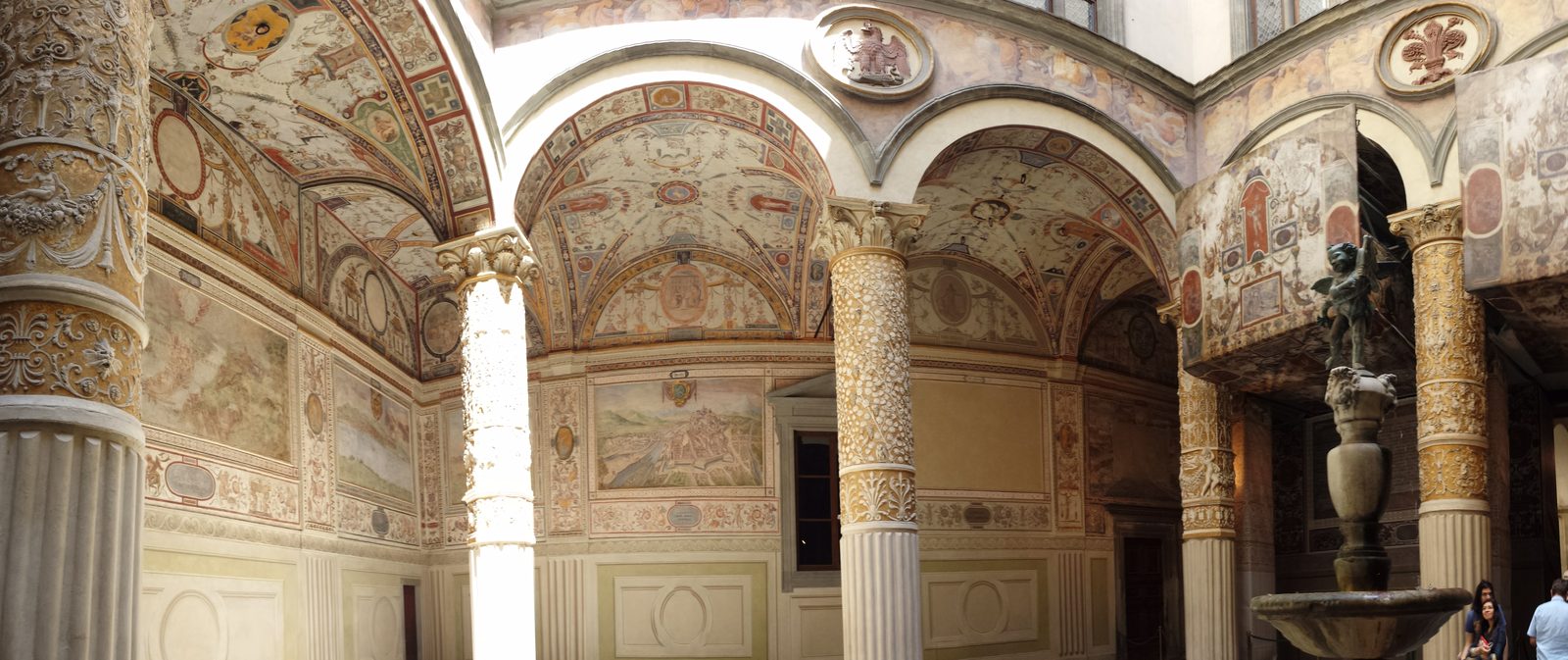 Frescoes in the palazzo courtyard