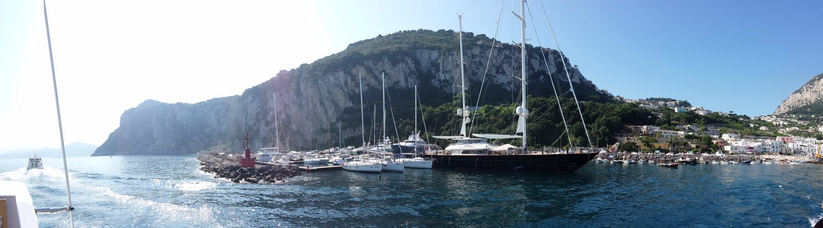 Capri's harbor, ringed by cliffs