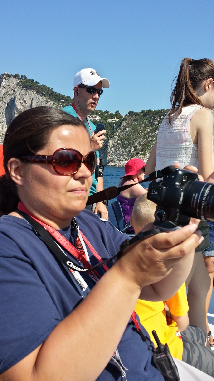 Kathy photographing the coastline from the boat