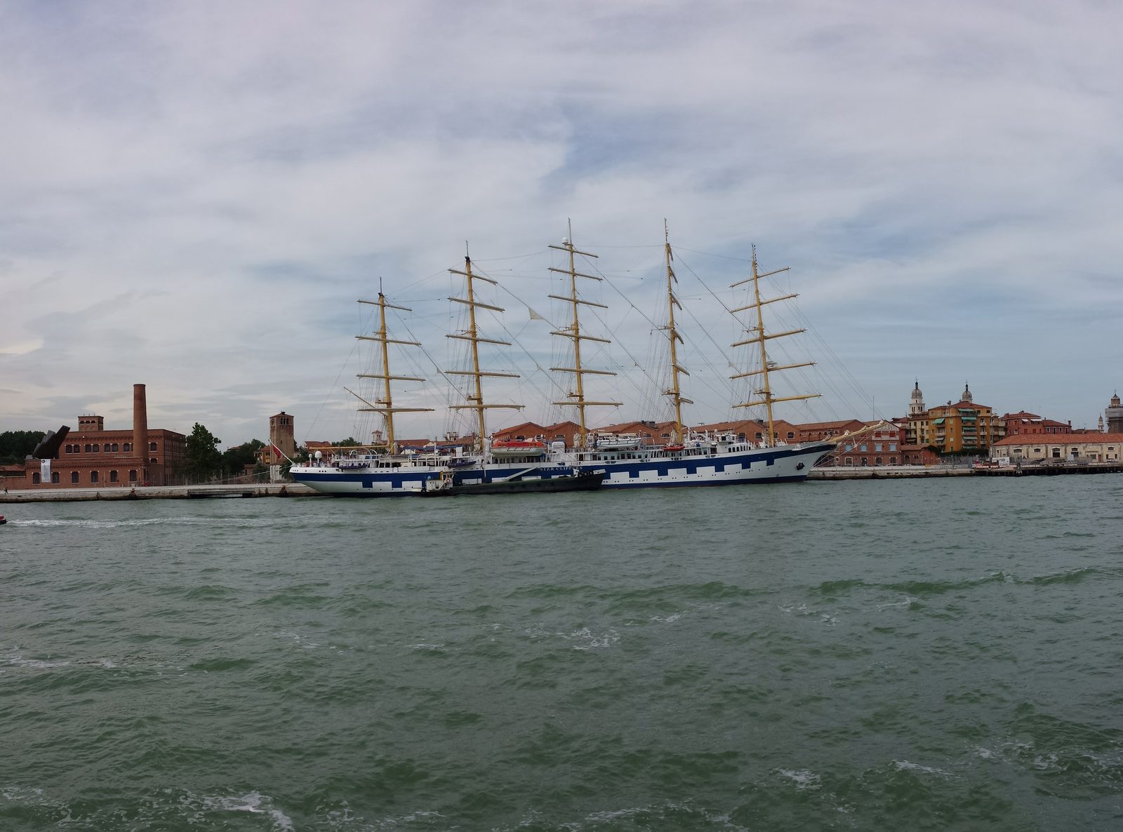 A tall ship passing in the lagoon