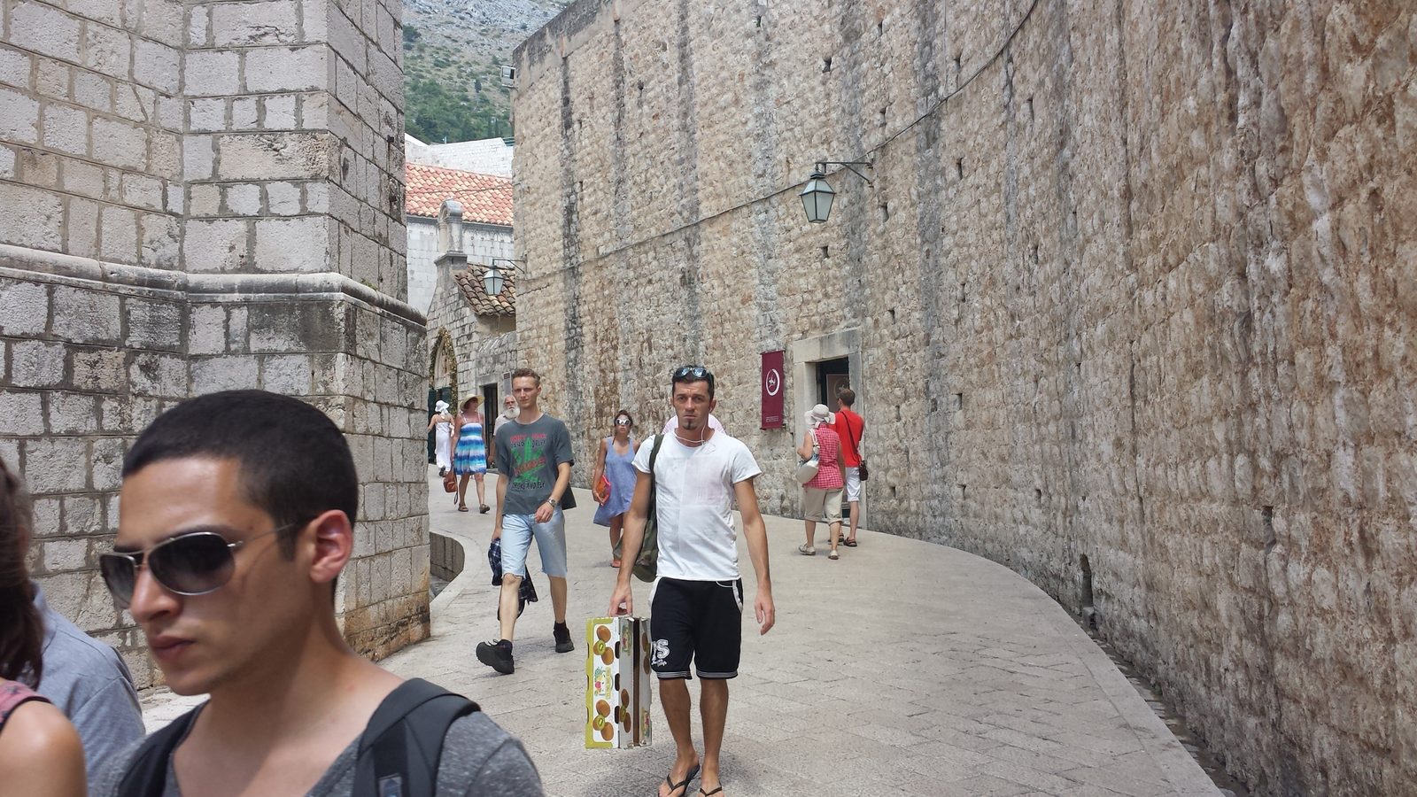 Walking the stone streets below the city wall