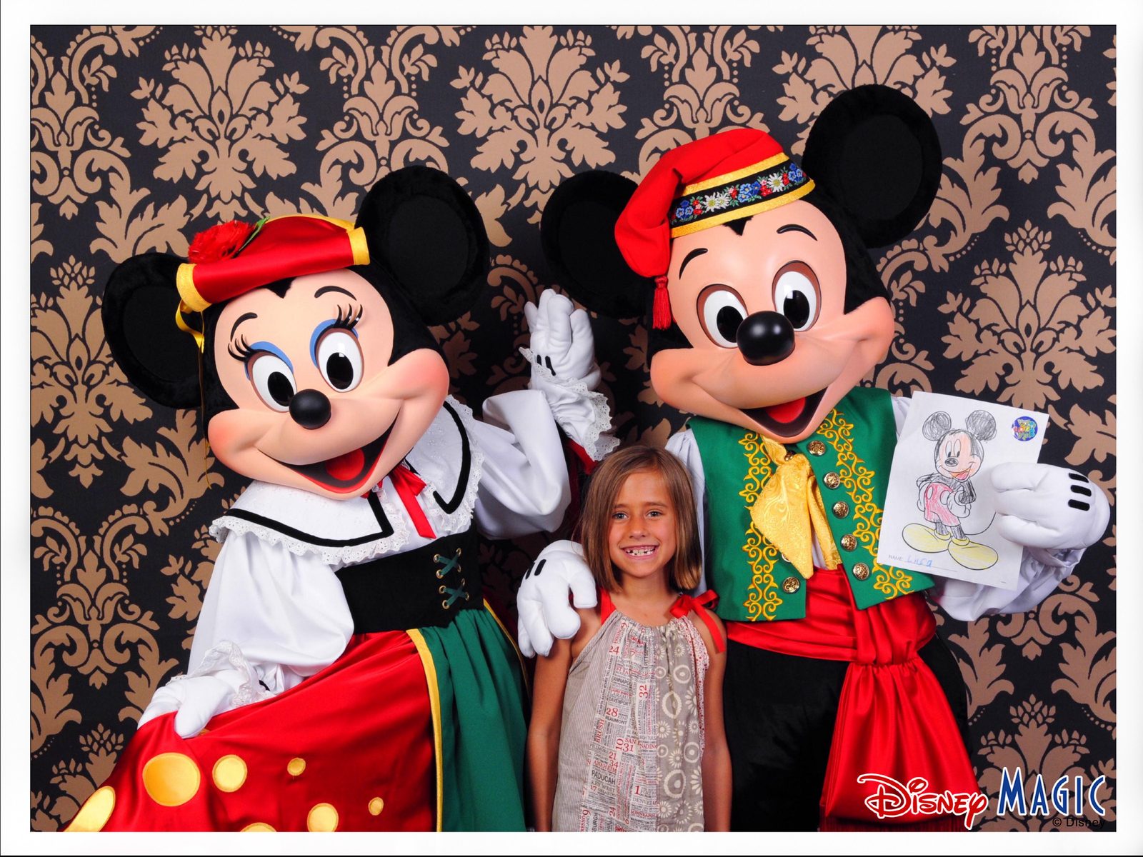 Minnie and Mickey in their Italian-inspired outfits with Lisa and the picture she colored