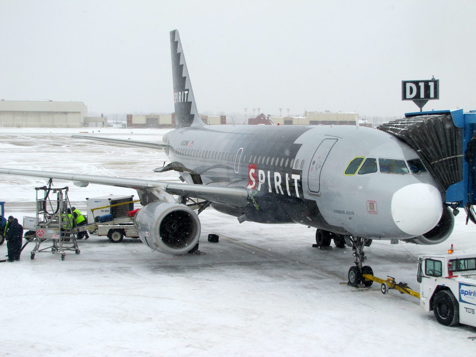 Our Spirit Airlines jet on the snowy tarmac