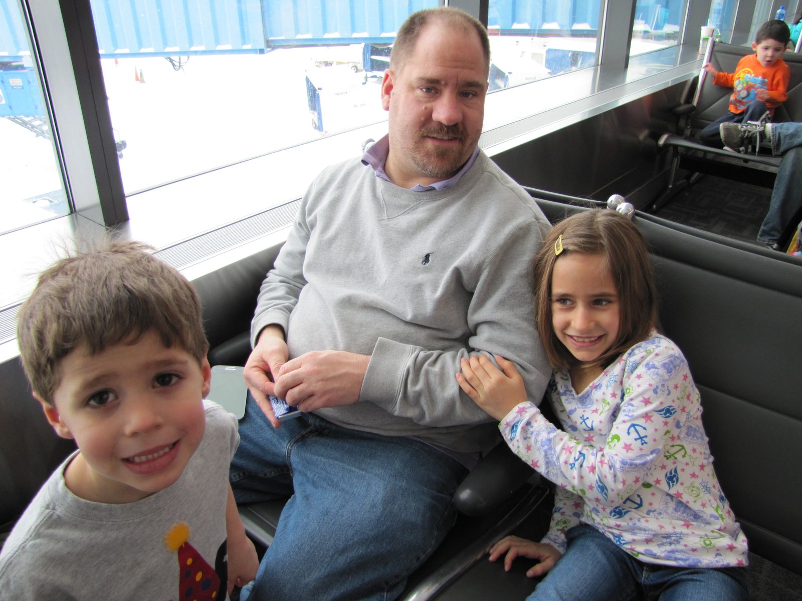 Thomas and Lisa with me, waiting at the gate