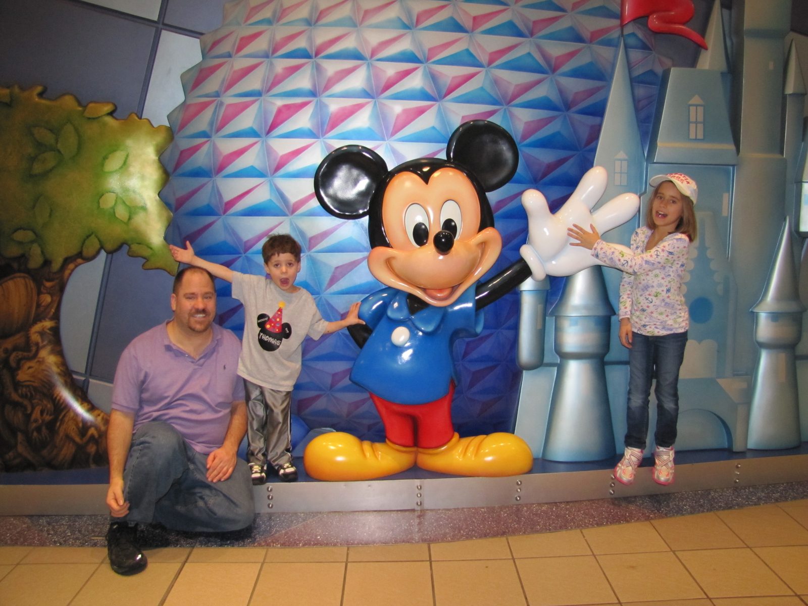 Lisa, Thomas and me by a Mickey Mouse statue