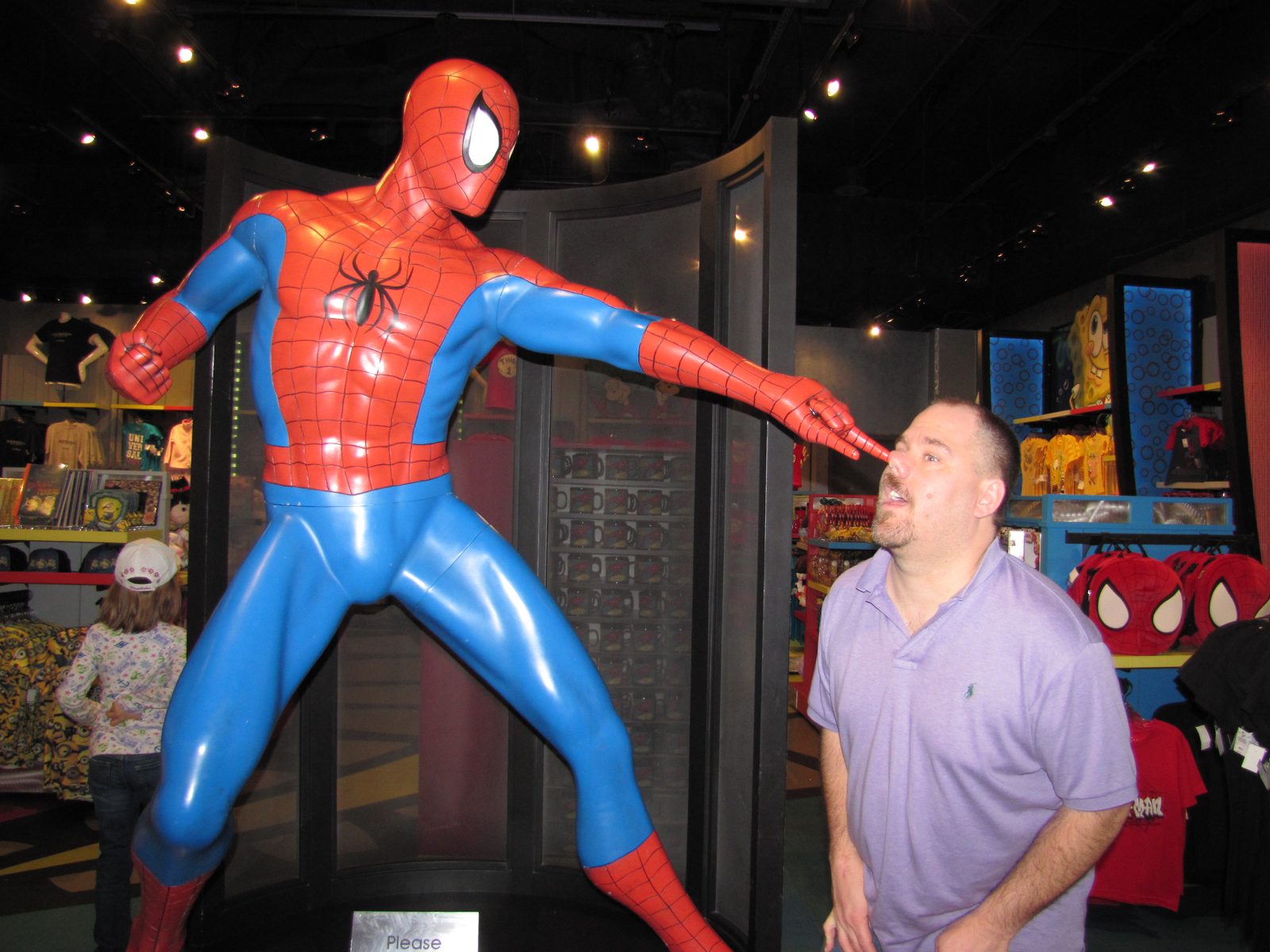 Me getting jabbed by a Spider-Man statue