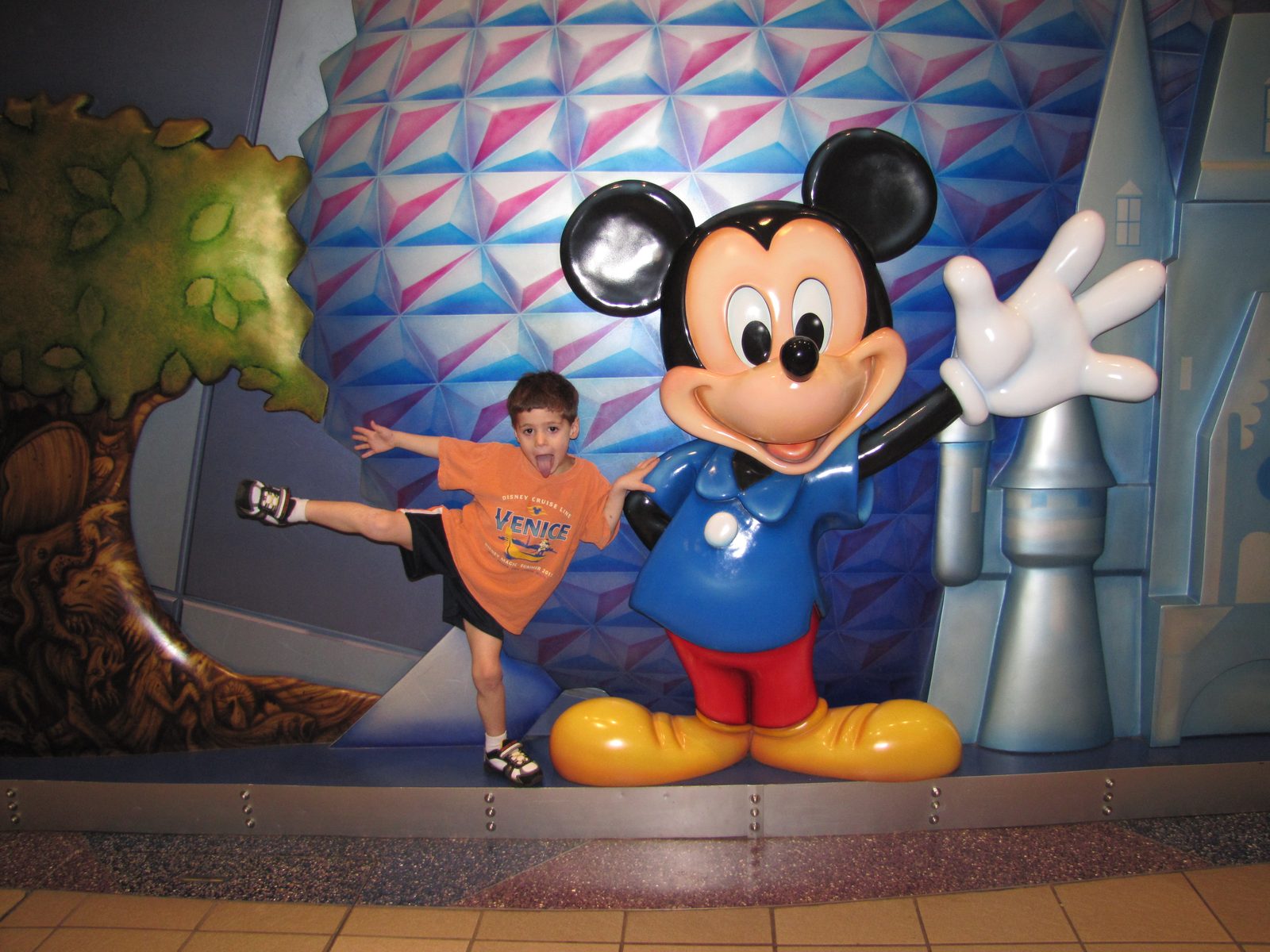 Thomas with Mickey at the airport Disney store