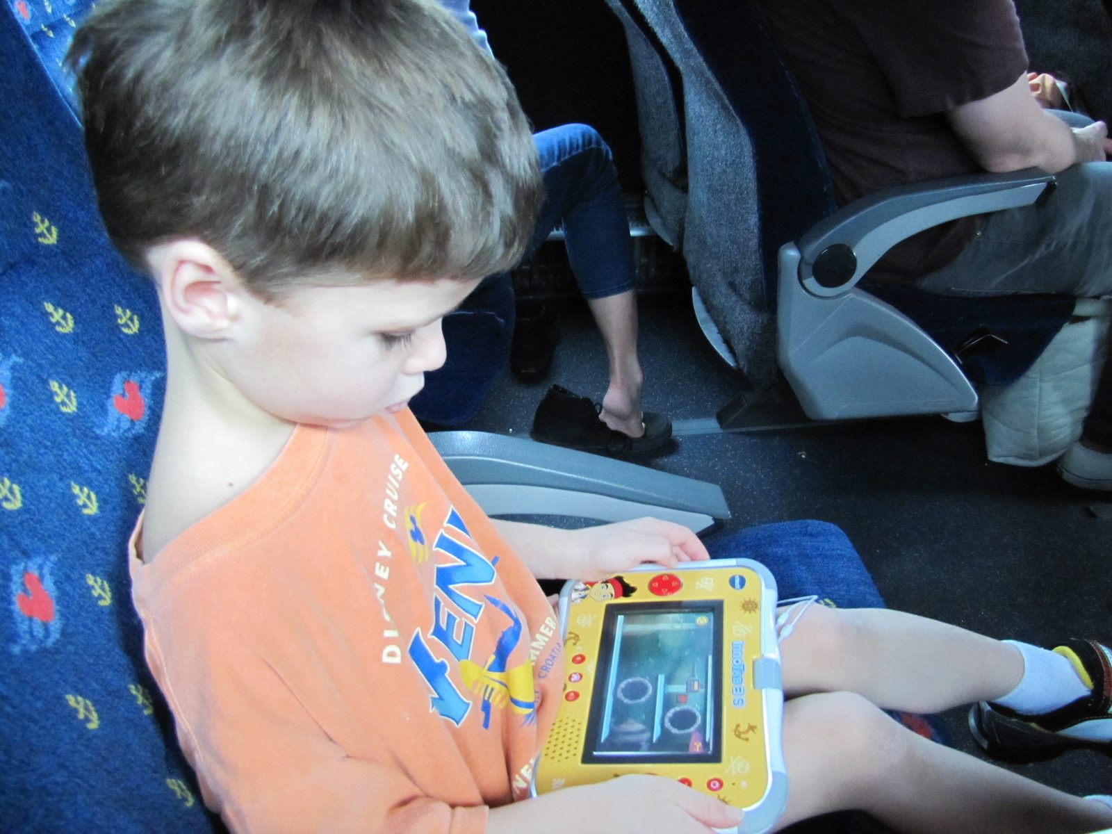 Thomas playing on the bus to Port Canaveral