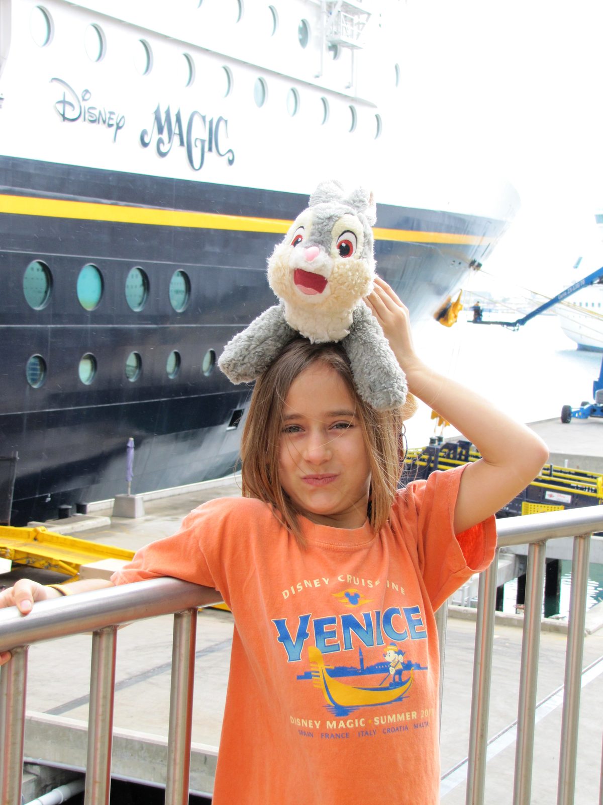 Lisa and her bunny on the pier beside the Magic
