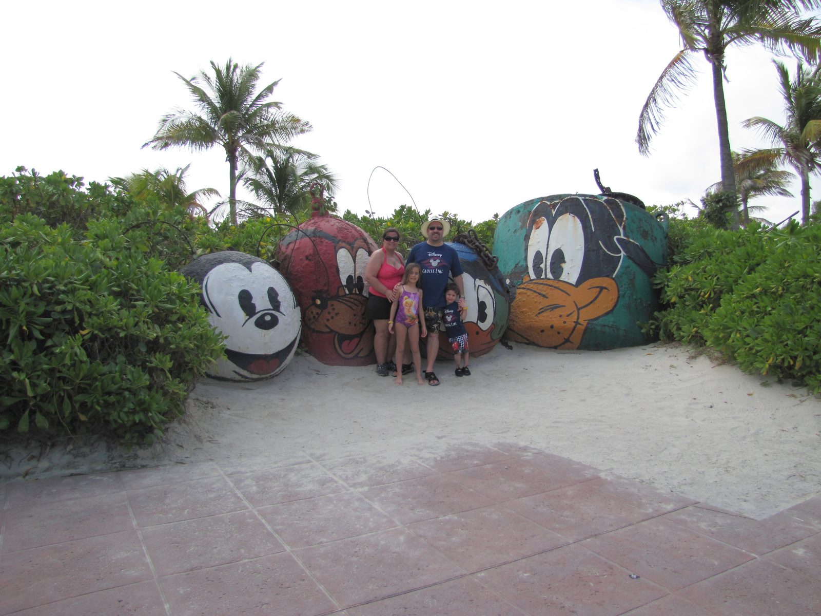 Lisa and me by the painted Mickey and Donald rocks