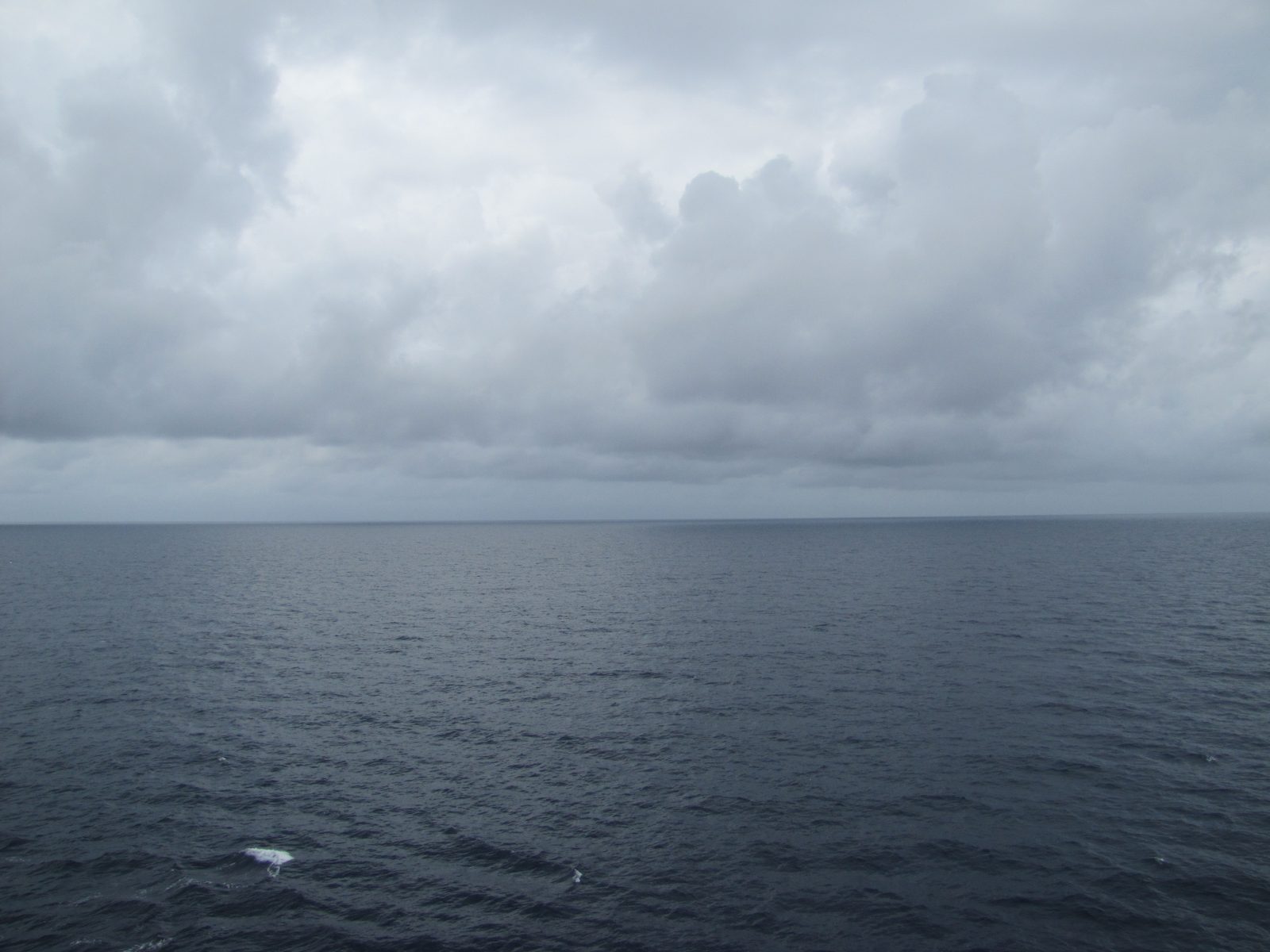 Grey skies over open water on our sea day