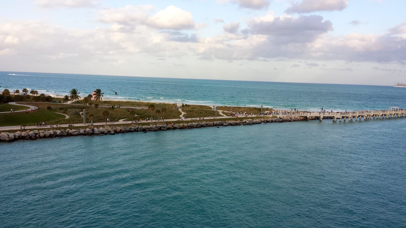 Sailing out of Miami past the jetty