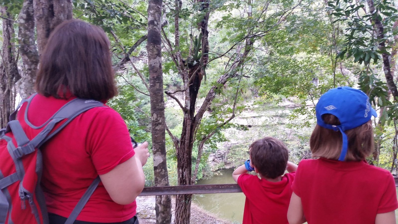 Kathy, Lisa and Thomas overlook the cenote