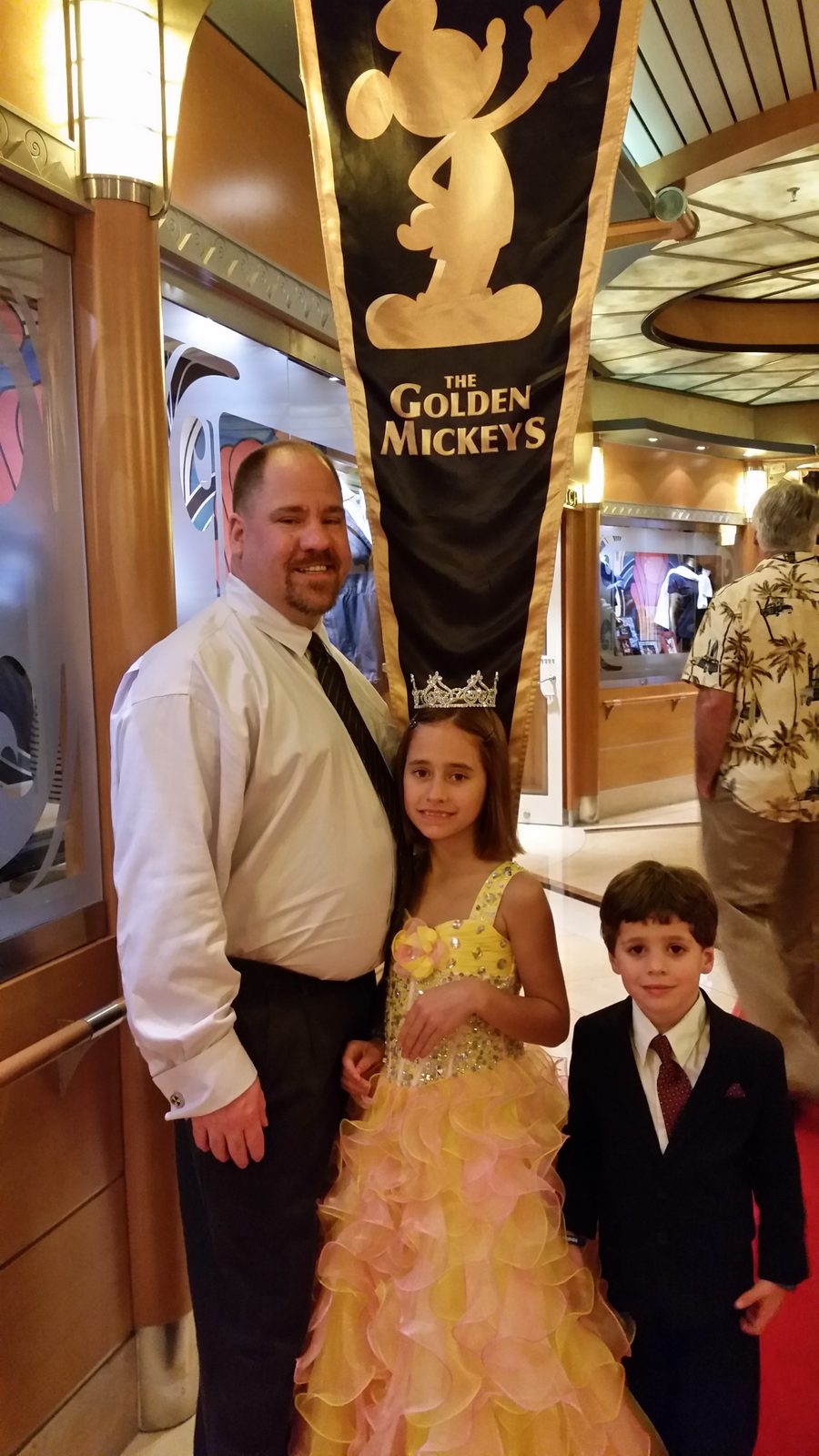 Lisa, Thomas and me under the Golden Mickeys banner