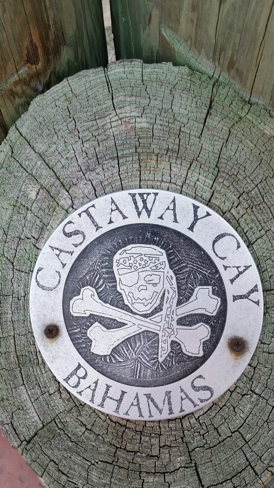 The Castaway Cay sign at the pier