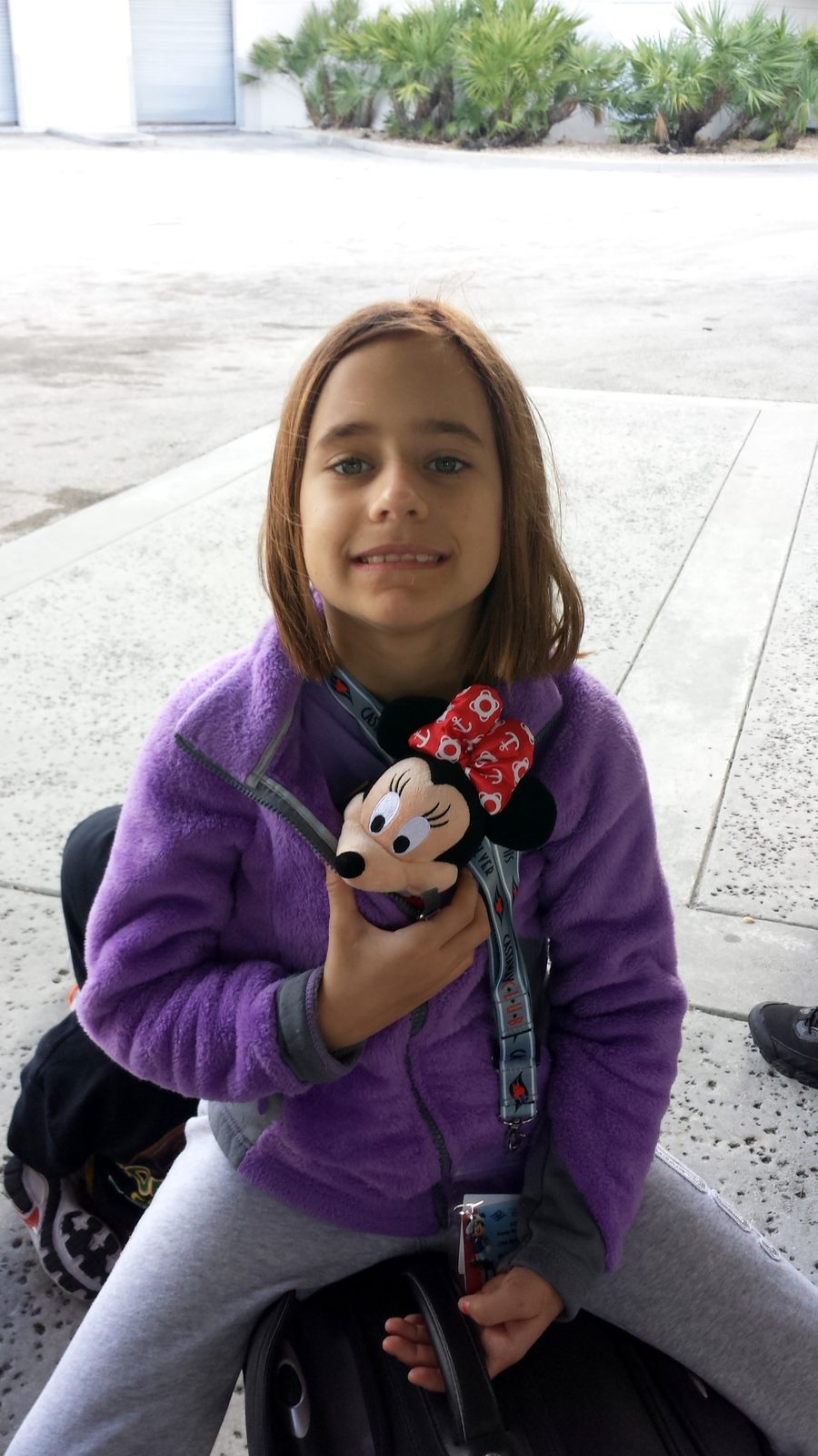 Lisa with her Minnie doll on our way home