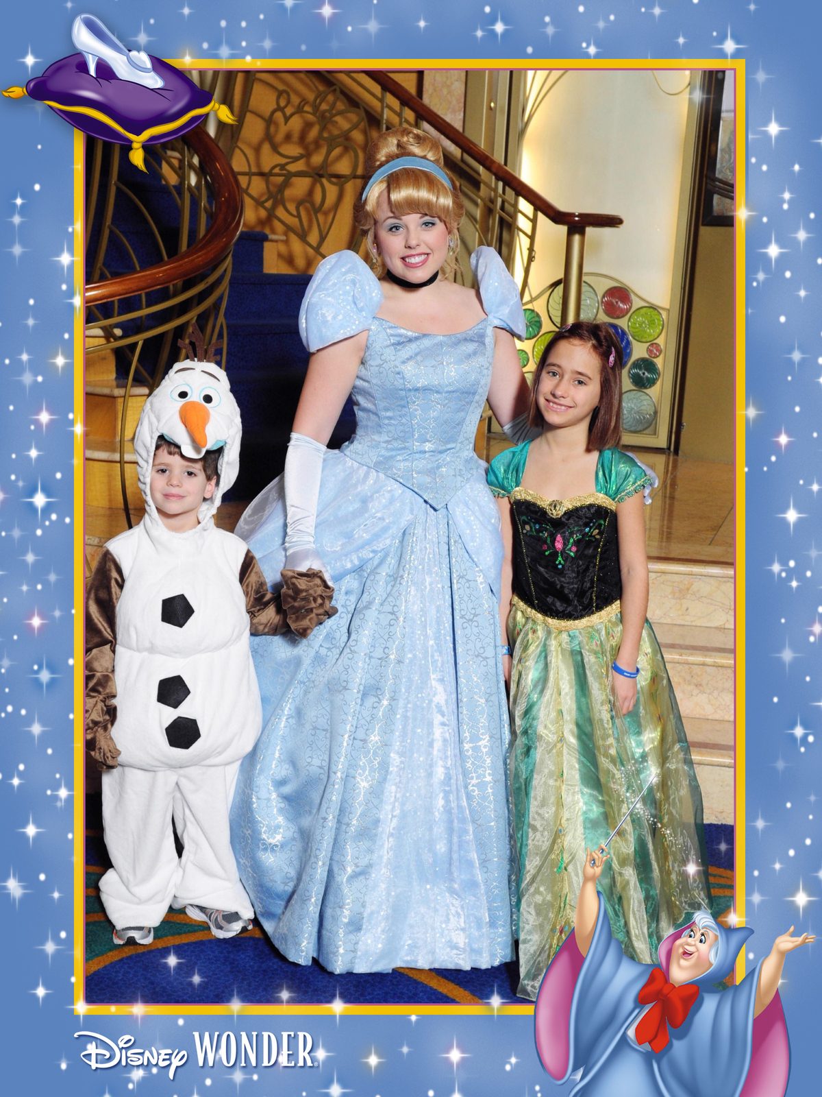 Thomas dressed as Olaf, Cinderella and Lisa in her Anna dress in the Lobby Atrium