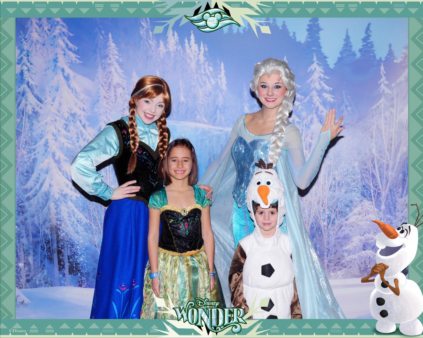 Anna, Lisa in her Anna dress, Elsa and Thomas dressed as Olaf