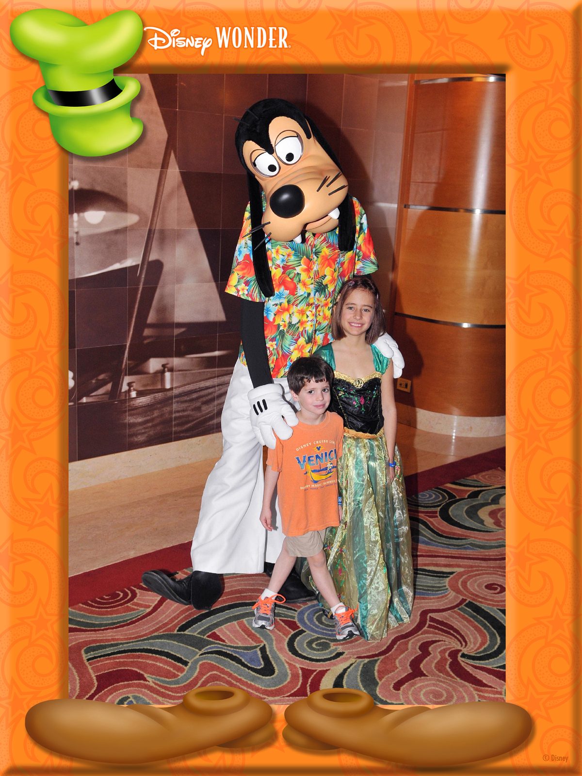 Goofy in his Hawaiian shirt with Thomas and Lisa