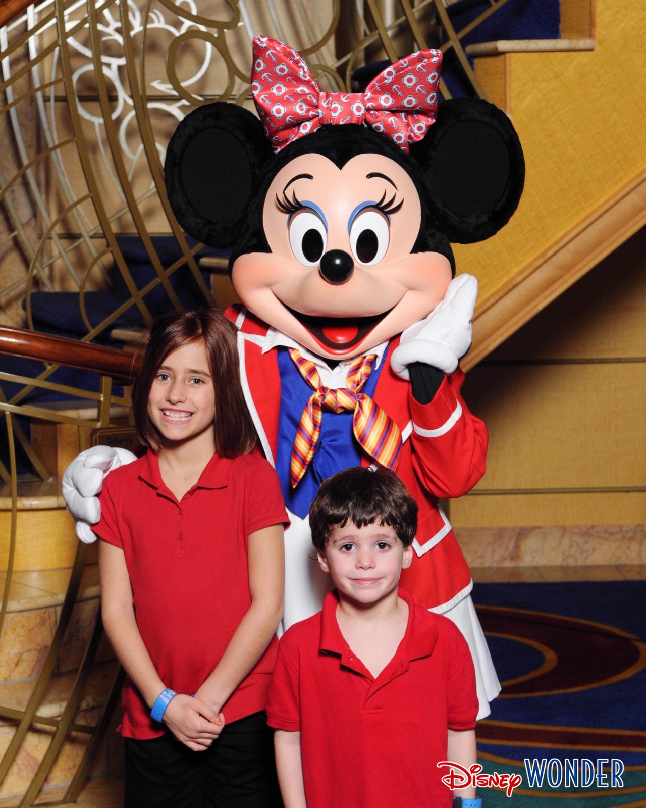 Lisa, Minnie Mouse in her sailor outfit and Thomas in the Lobby Atrium