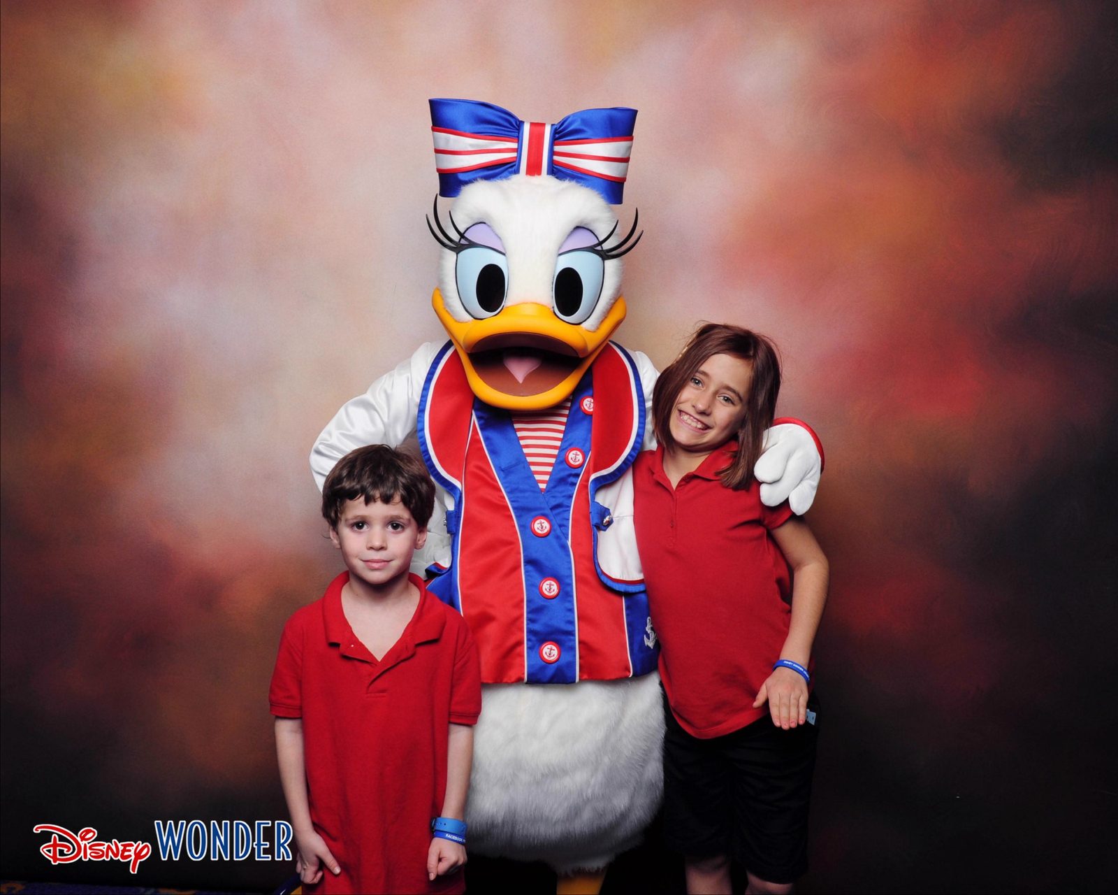 Thomas, Daisy Duck in her red, white and blue sailor outfit and Lisa