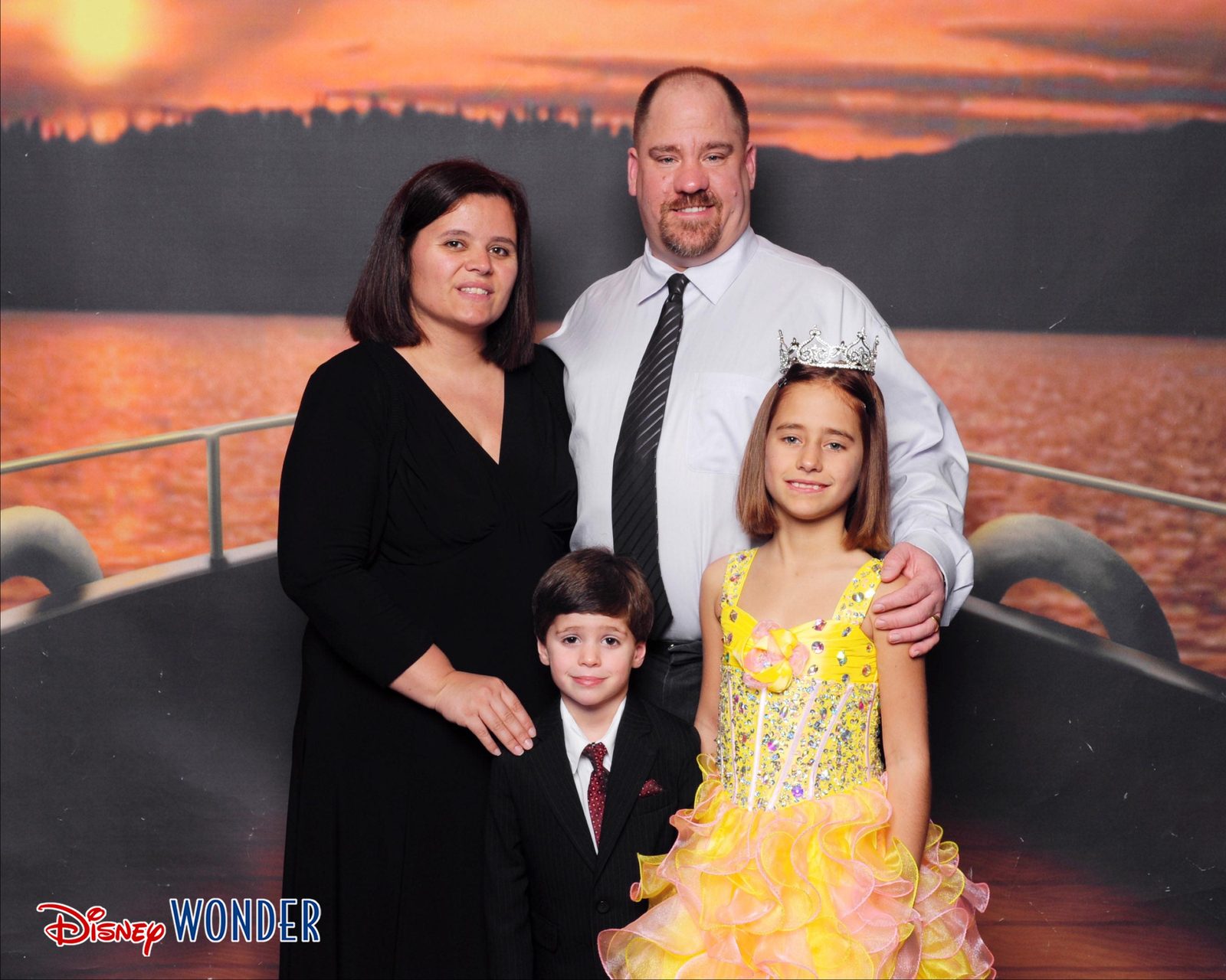 Dressed up for a portrait under the sunset backdrop