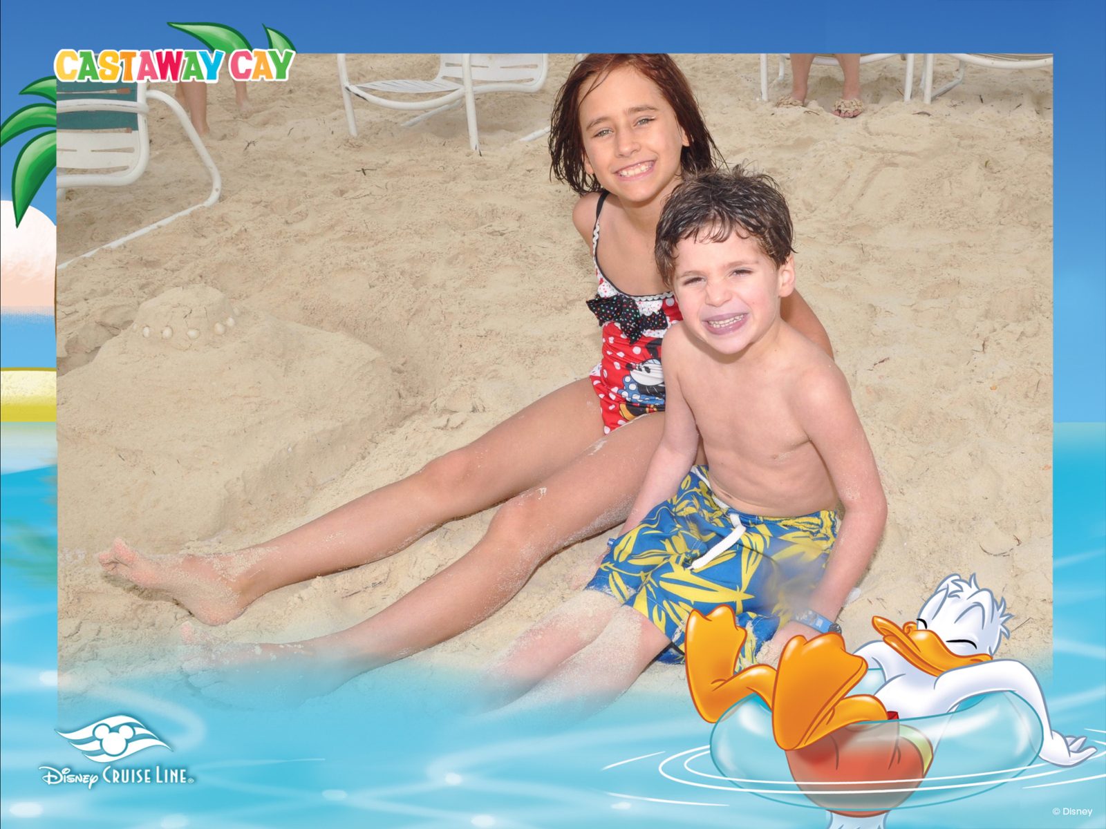 Lisa and Thomas in the sand at Castaway Cay
