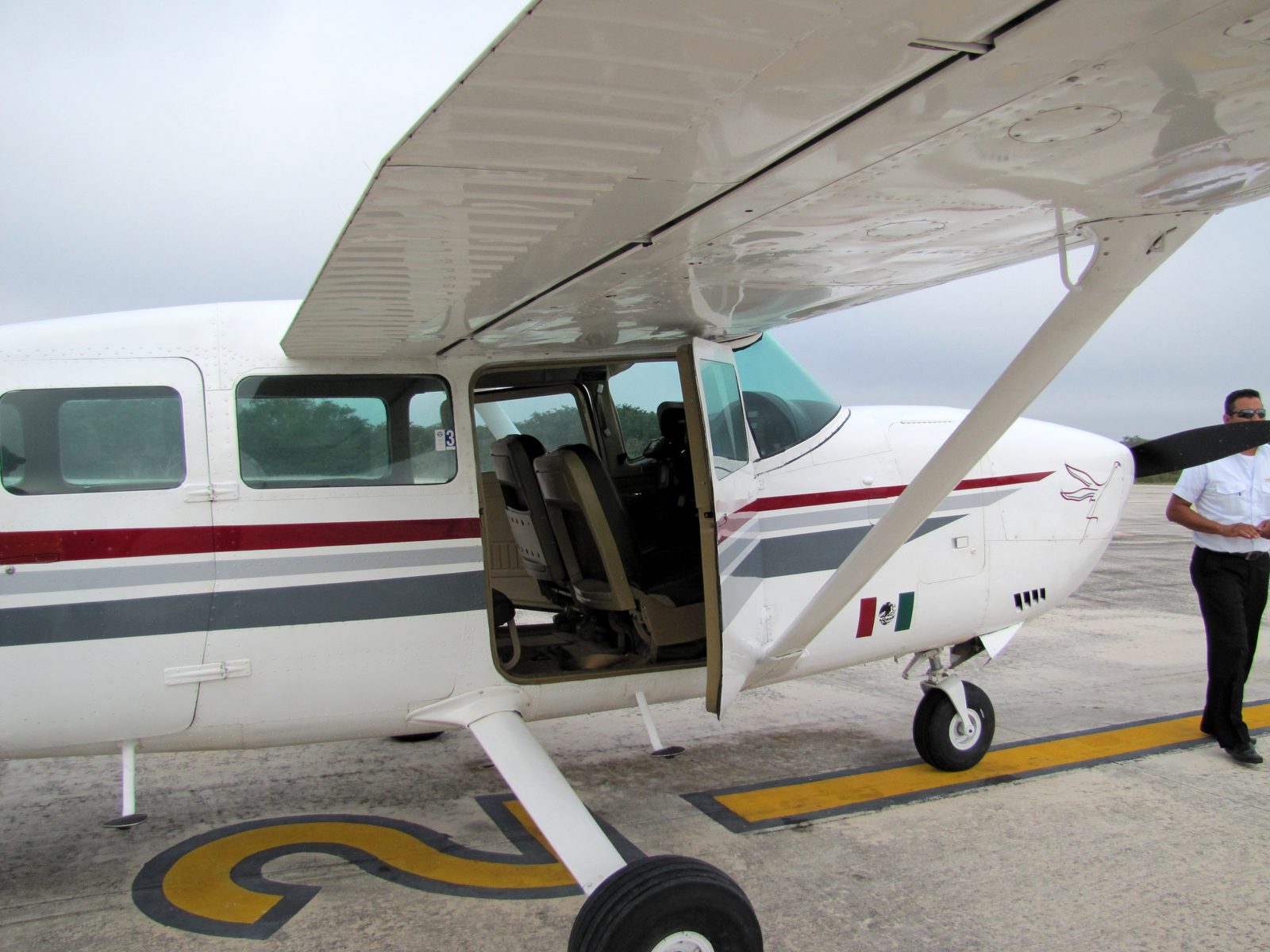 Our Cessna on the airstrip at Chichen Itza