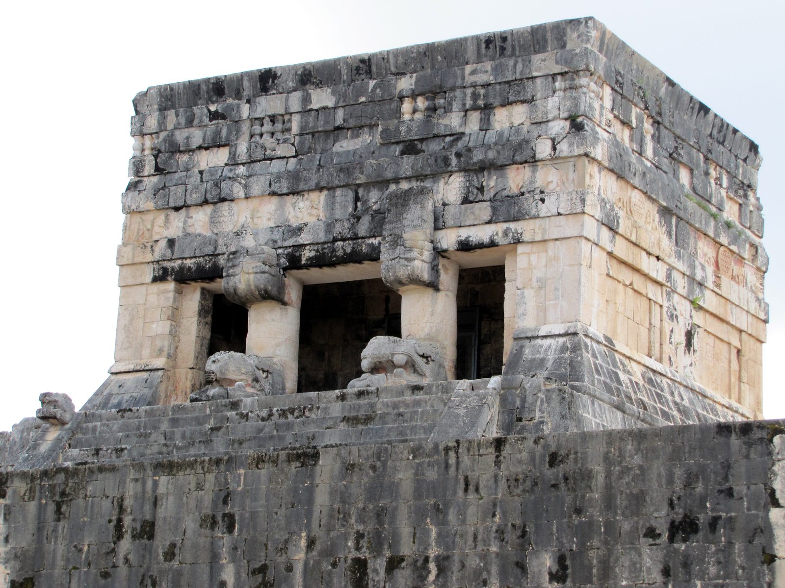 Stone temple high on a wall at Chichen Itza