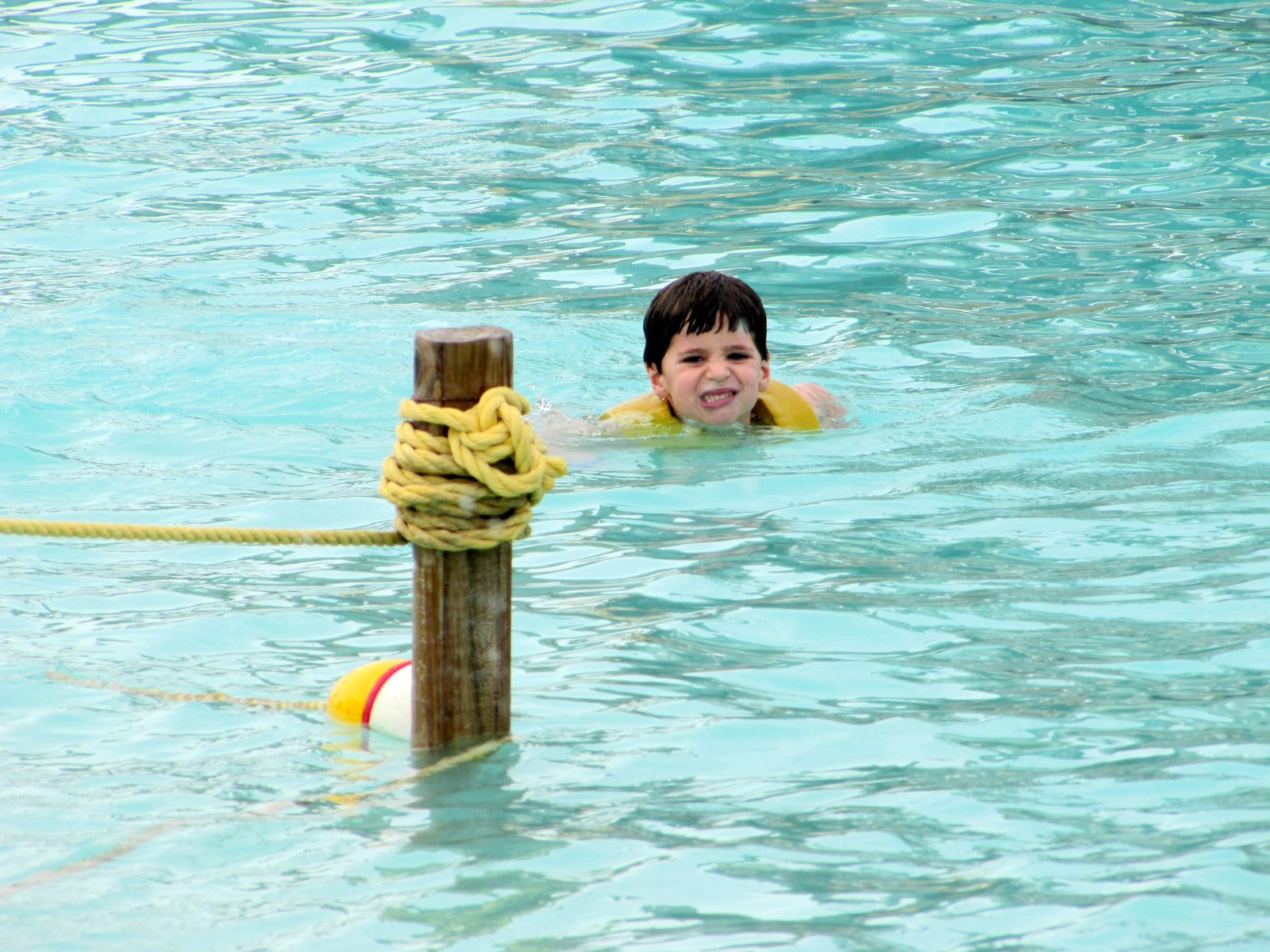 Thomas swimming back from Pelican Plunge