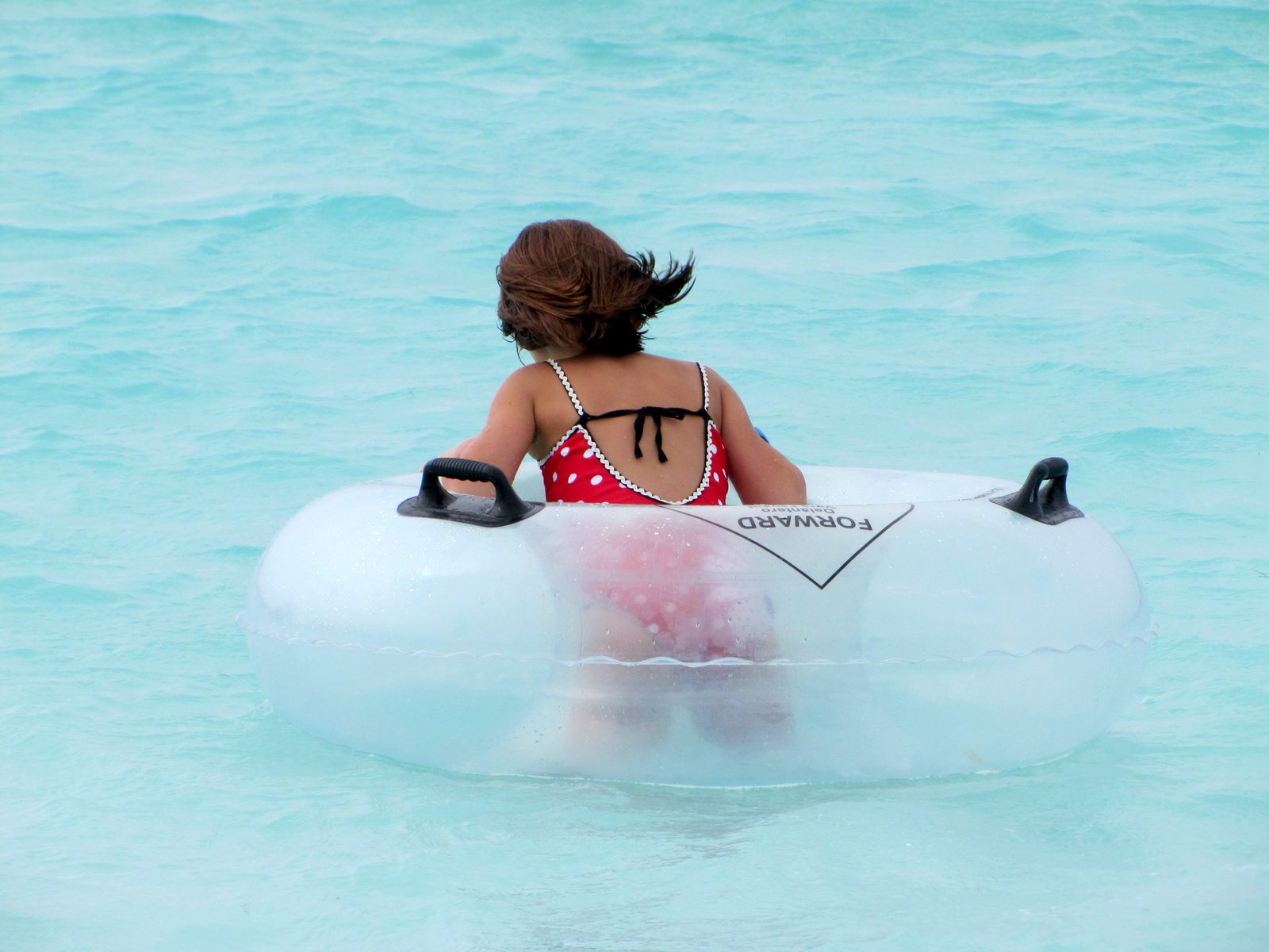 Lisa out on a rented tube at Castaway Cay