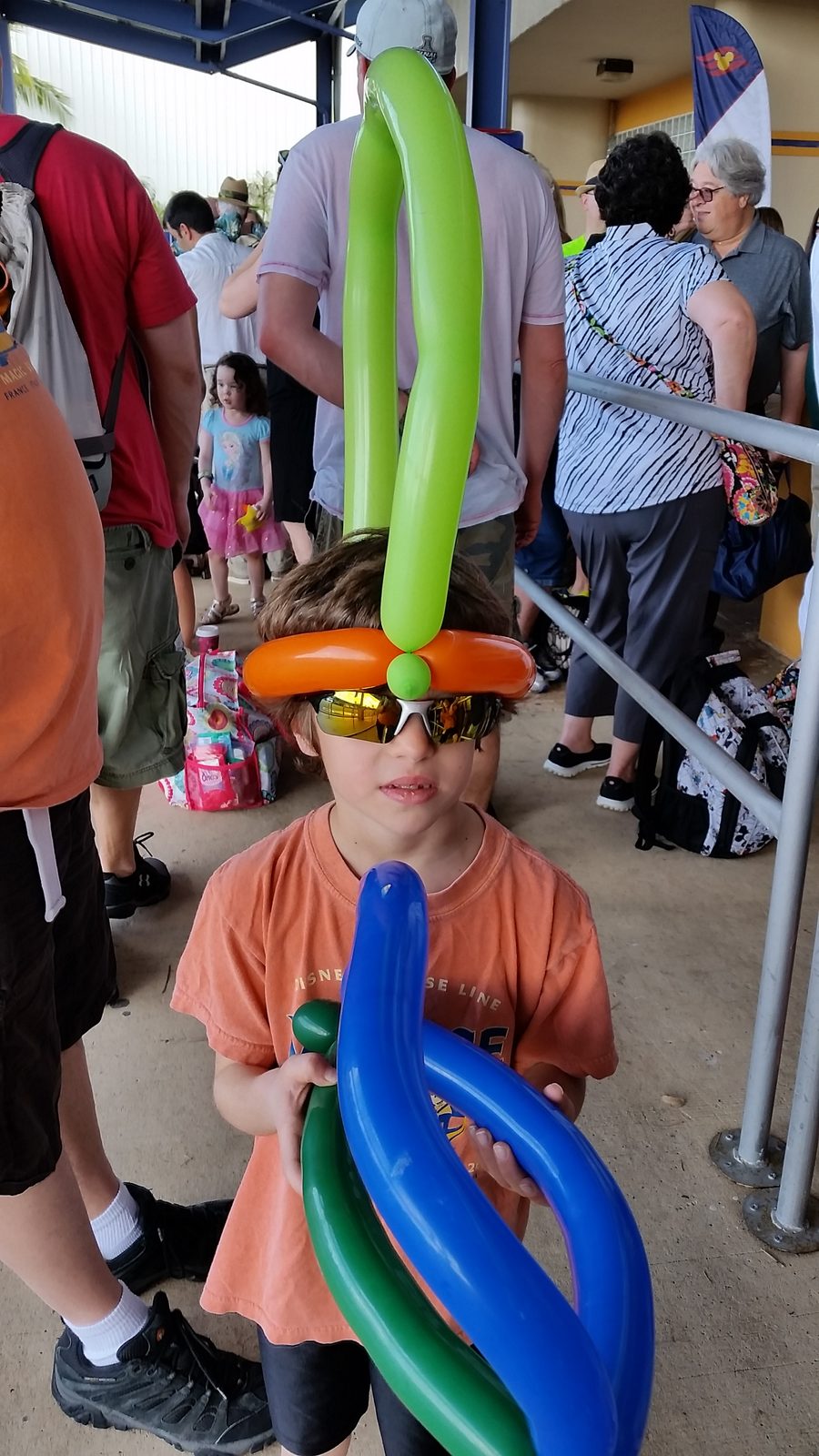 A balloon hat while we waited in line in San Juan