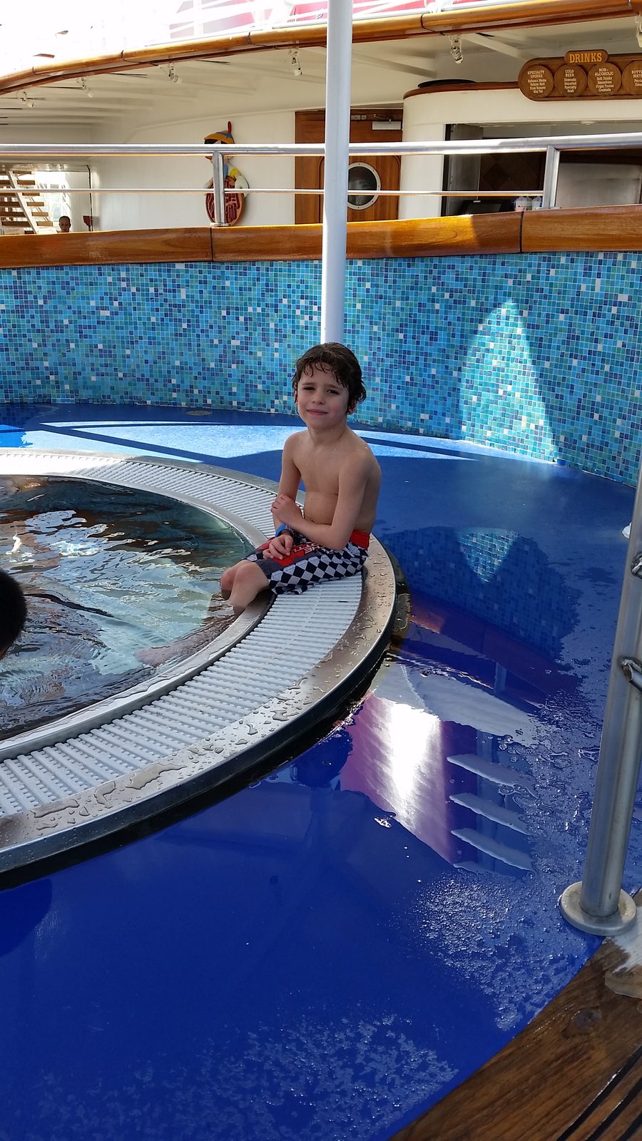 Thomas on the edge of the pool on the Wonder