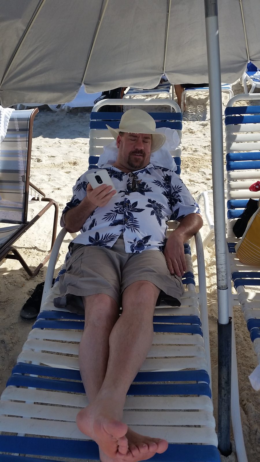 Settled into a beach chair at Jolly Beach