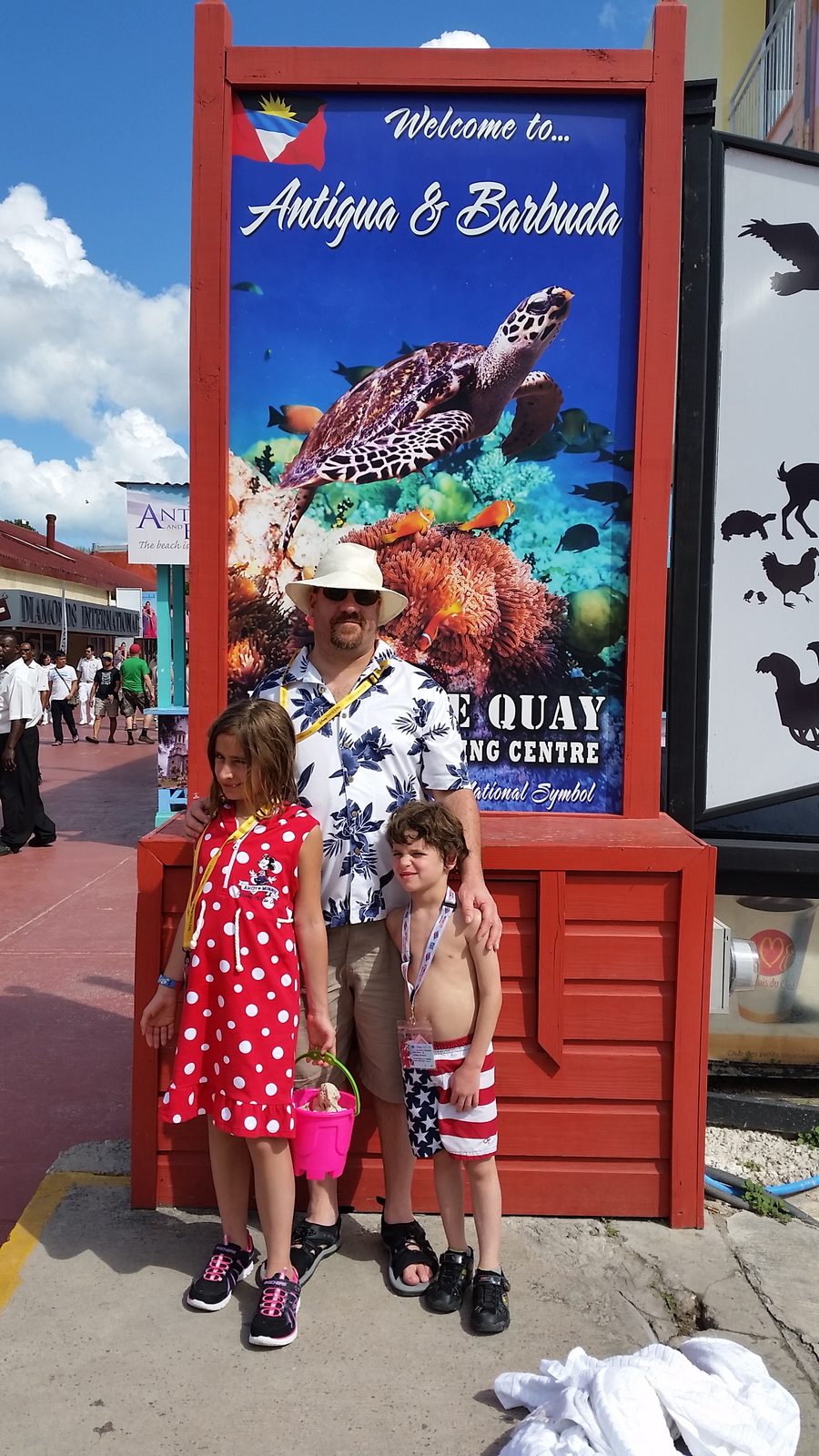 At the welcome sign for Antigua and Barbuda