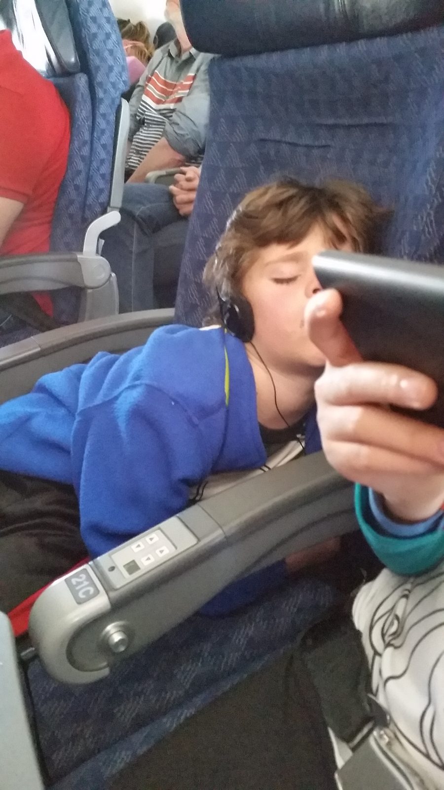 Thomas sleeping mid-flight
