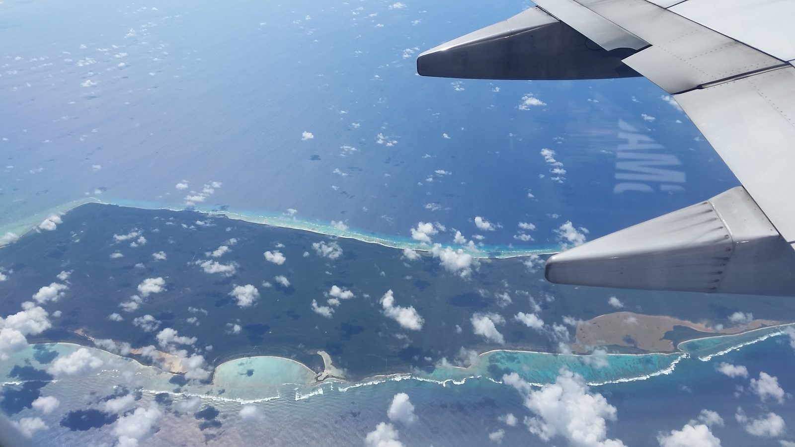 Coral reefs from the window somewhere over the Bahamas