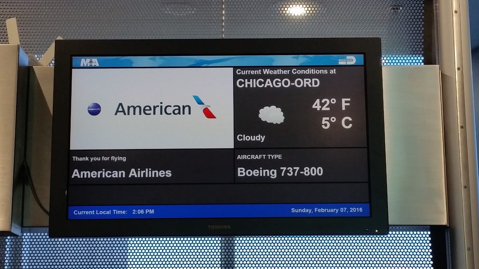 Checking the board for our Chicago flight
