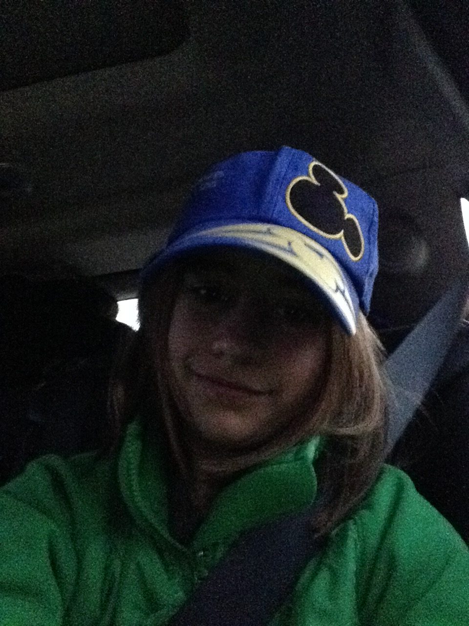 Lisa in her Mickey ears, on the way to the airport